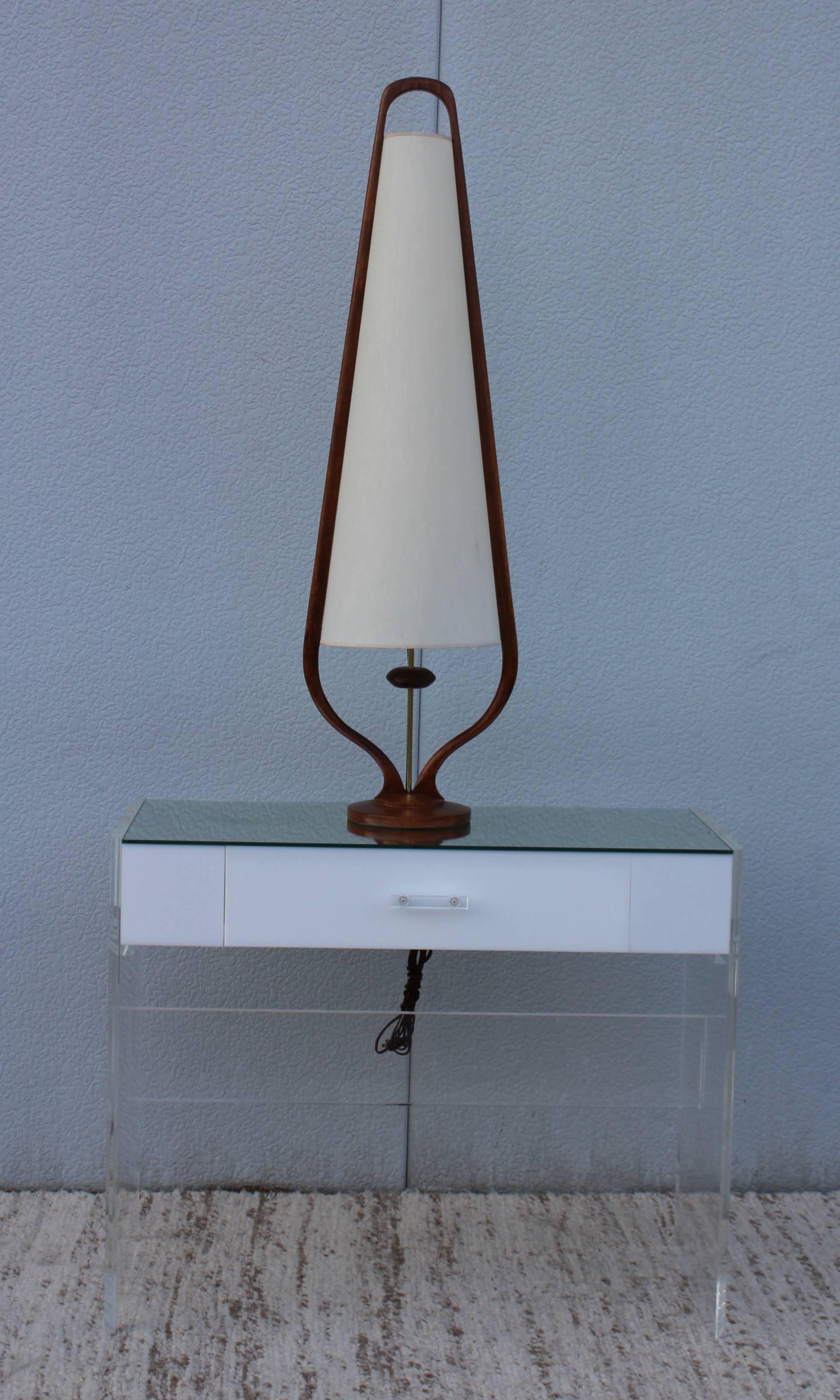 Stunning tall, 1960s walnut table lamp by Modeline.