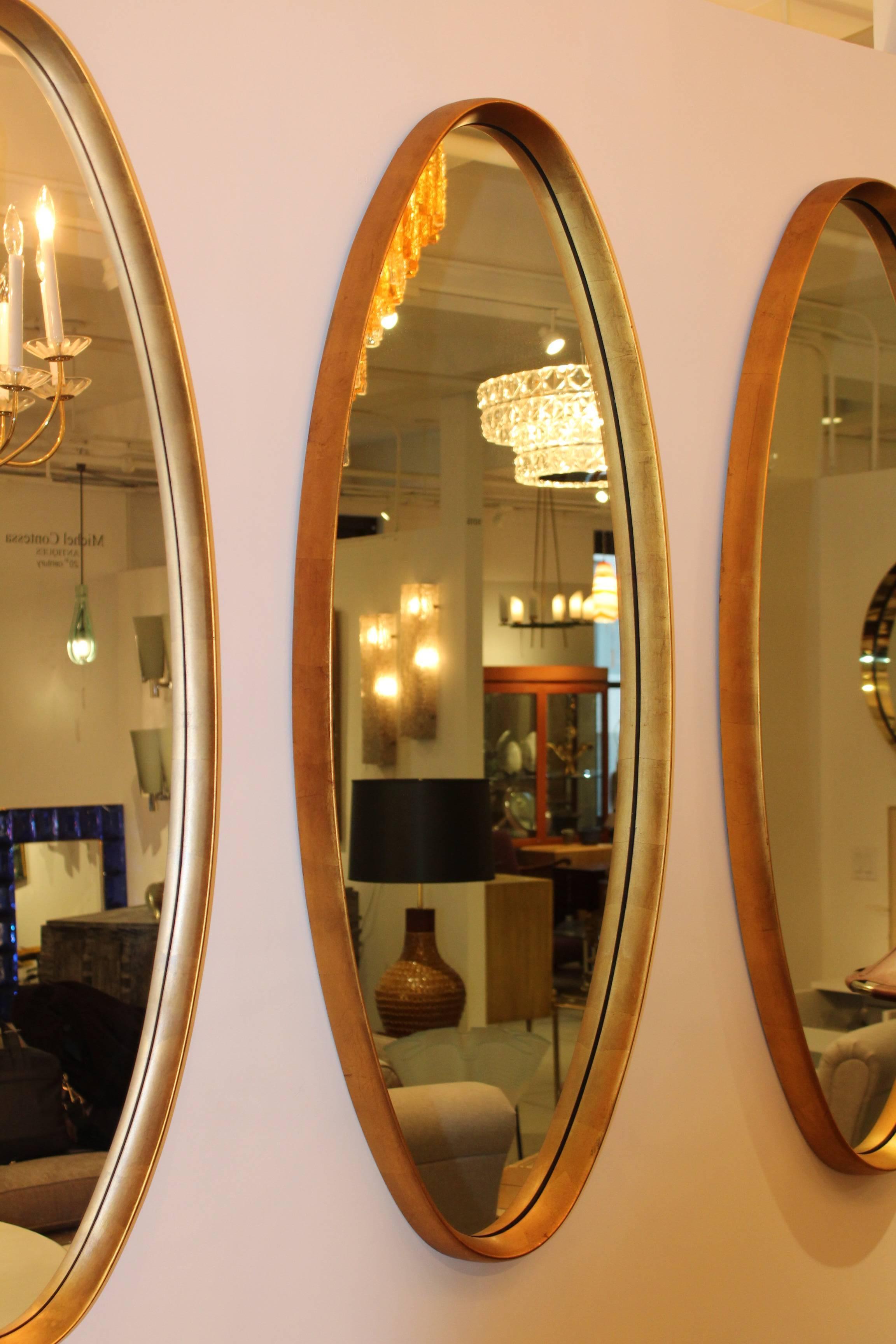 20th Century Mid-Century Modern Gold Leaf Oval Mirrors