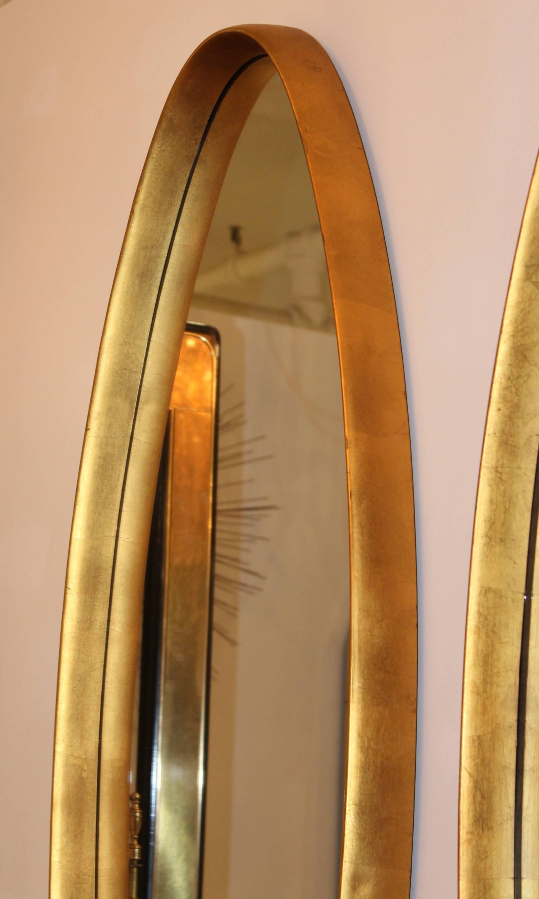 American Mid-Century Modern Gold Leaf Oval Mirrors