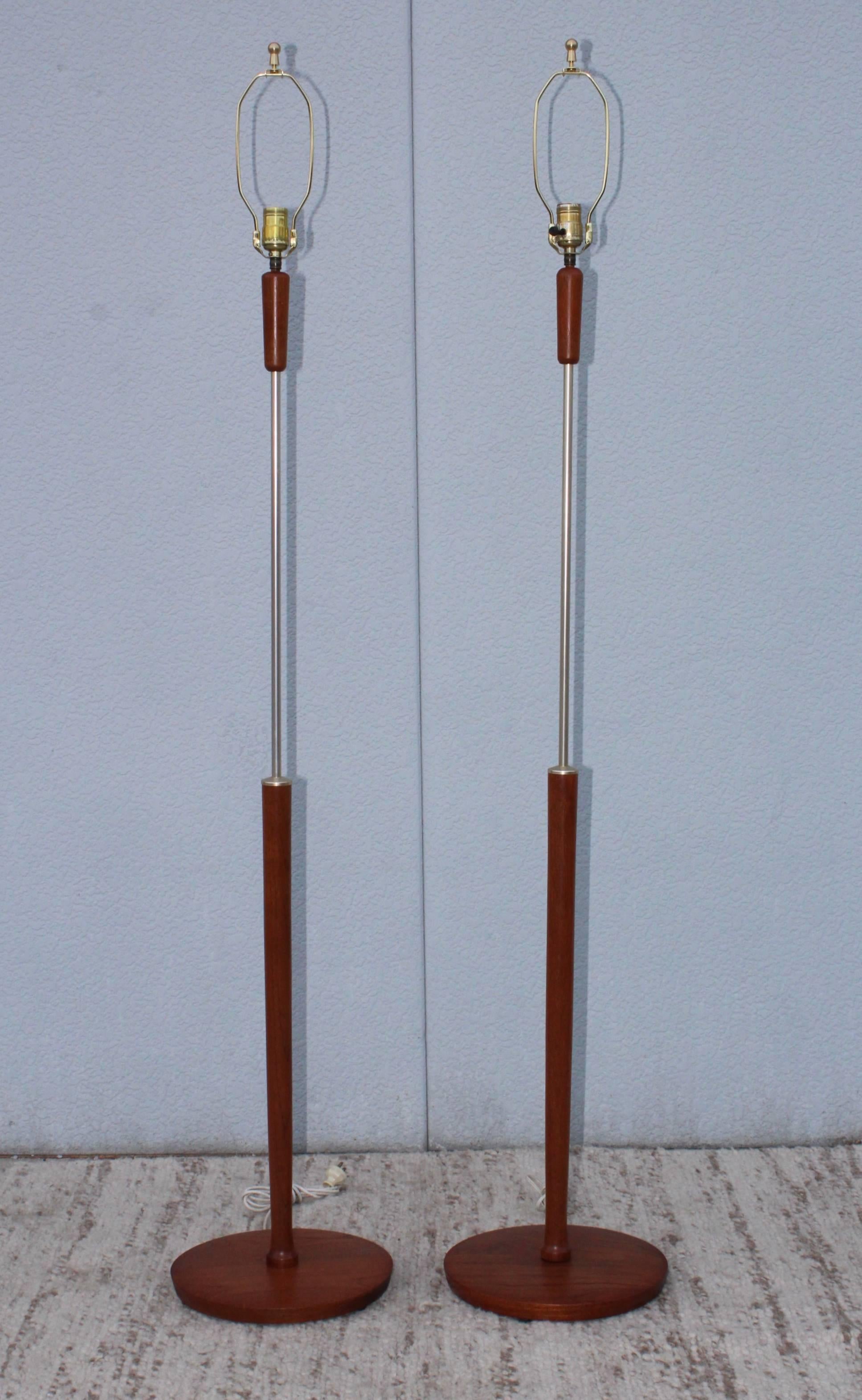 1960's Danish teak with chrome detail floor lamps.

Shades for photography only.