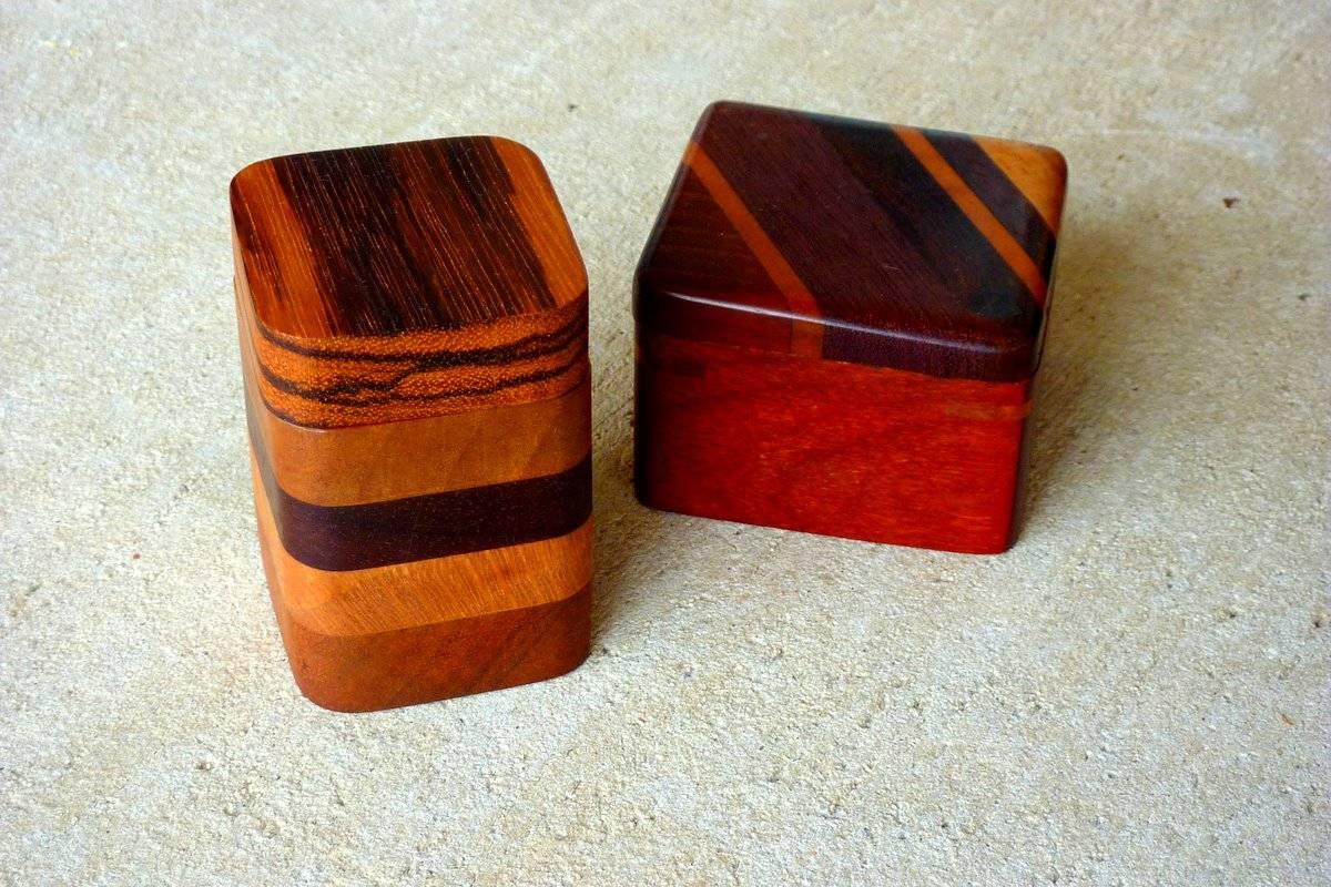 Two one-of-a-kind heirloom lidded boxes made of figured and unusual hardwoods by Timothy Lydgate. One signed and dated Seattle, 1986.

Dimensions are as follows:
Signed box 2.625