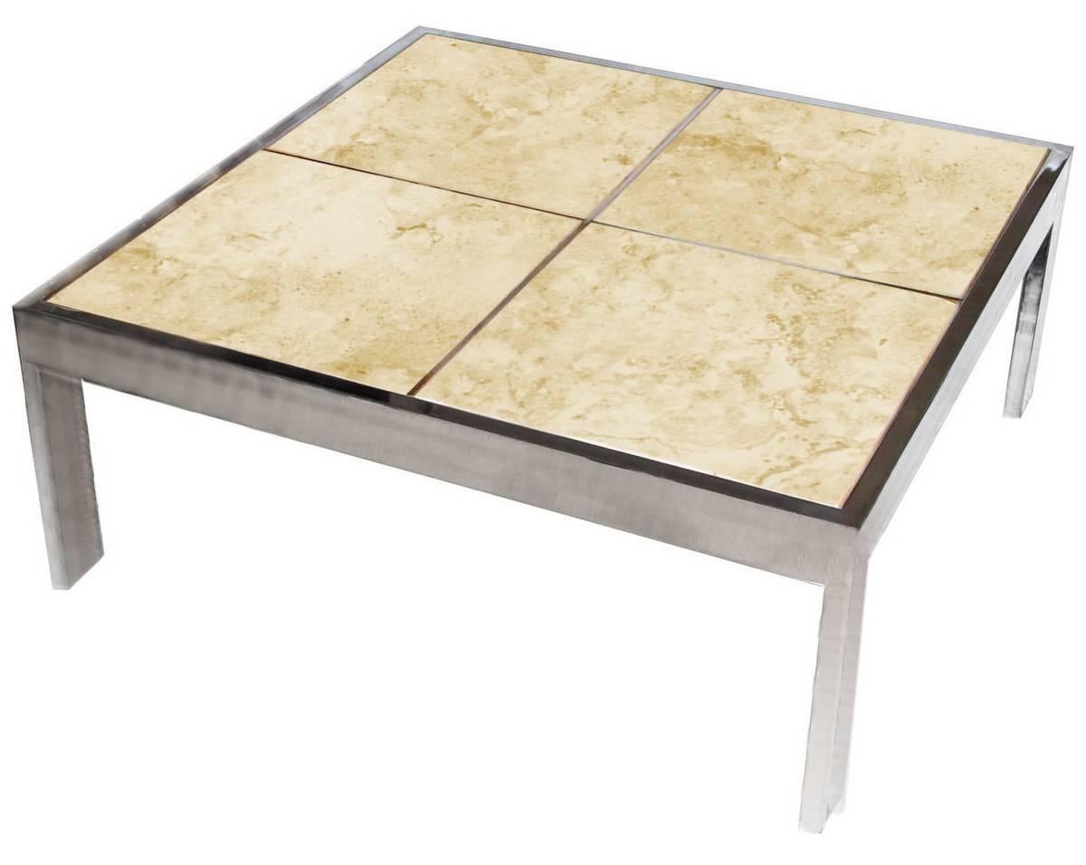 Usually seen with marble inserts, this striking cocktail table by Leon Rosen for Pace Collection features ceramic tiles set into a base of chrome-plated steel polished to a mirror finish.

A few important notes about all items available through this