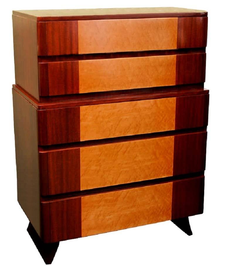 An Art Deco style highboy in beautiful contrasting mahogany and birseye maple veneers by R-Way. Five drawers.

(Note: These are most commonly refinished with very light maple and very dark mahogany, which is a nice look if you happen to like stark