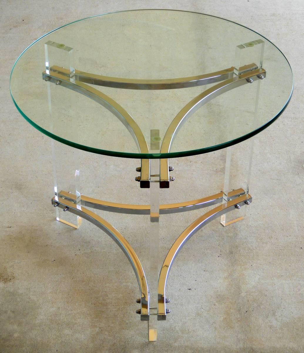 An exceptionally well-preserved pair of side tables in crystal clear Lucite and chrome-plated steel polished to a mirror finish. Designed by Charles Hollis Jones.

(Please see condition notes.)

We have the matching cocktail table. Just ask.

We