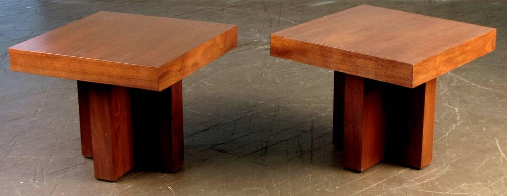 A beautifully massed pair of model 1922 walnut occasional tables on cruciform bases by Milo Baughman for Thayer Coggin. Ideal when combined as a single cocktail table.

We sometimes see these attributed to Adrian Pearsall for Craft Associates.