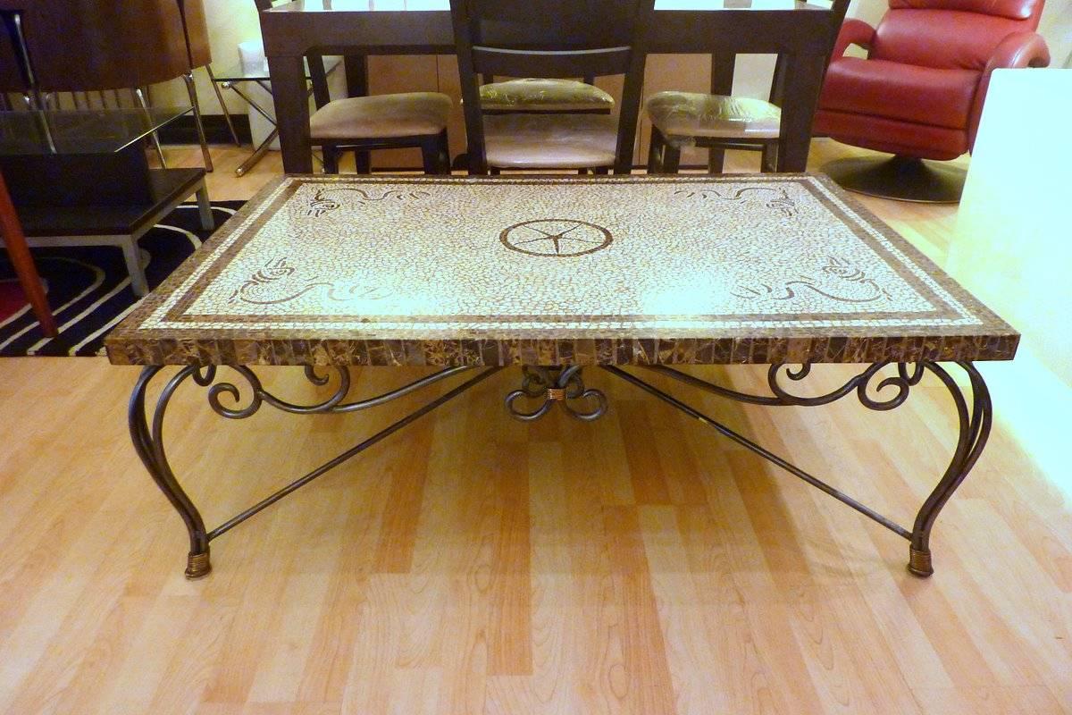 A magnificent, heavy, tessellated cocktail table in wrought iron by Maitland-Smith. The mosaic tile depicts fanciful creatures. Quality you can feel.

A few important notes about all items available through this 1stdibs dealer:

1. We list all our