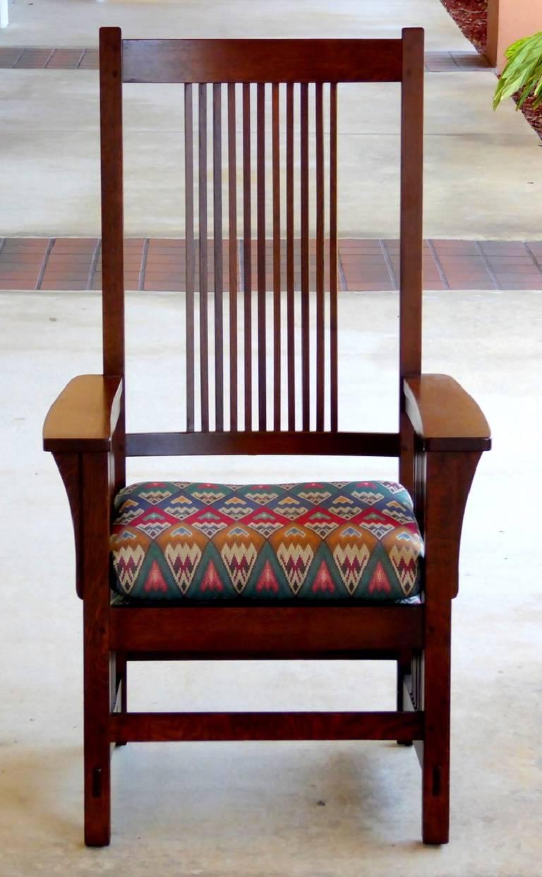 A stately spindle armchair by L. & J.G. Stickley in solid oak. Handsome good looks and fine craftsmanship. Superb in every way.

A few important notes about all items available through this 1stdibs dealer:

1. We list all our items as being in