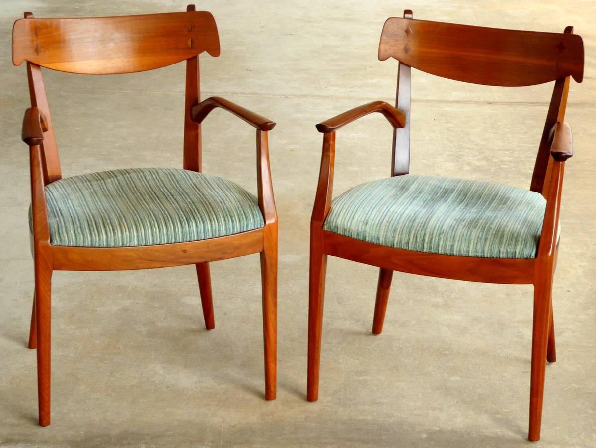 A stately pair of declaration armchairs by Kipp Stewart and Stuart MacDougall for Drexel. Solid walnut with rosewood inlay. Original green-blue striated fabric in good condition.

(Please note: We try to respond to messages within minutes, but in