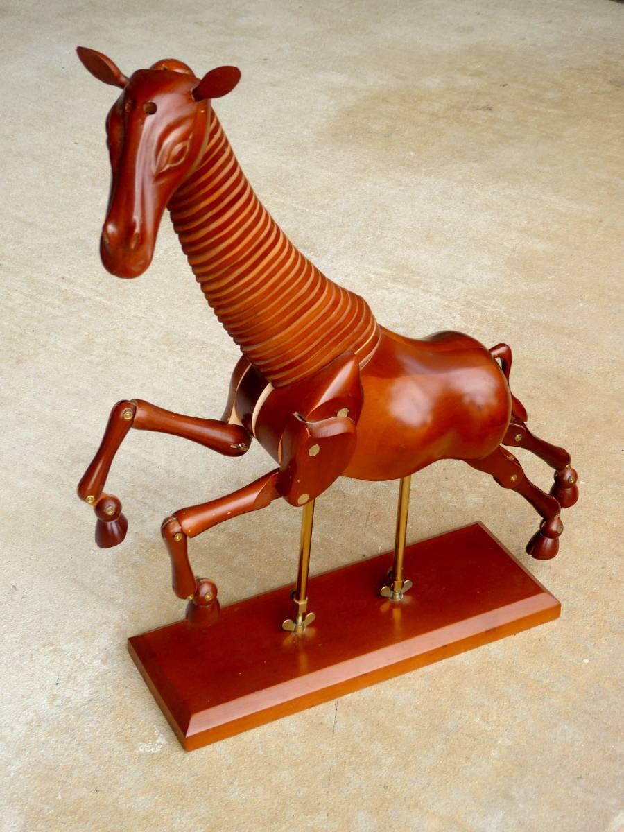 A spectacular articulating giraffe sculpture, probably an artist's model, in a rare form.

A few important notes about all items available through this 1stdibs dealer:

1. We list all our items as being in 