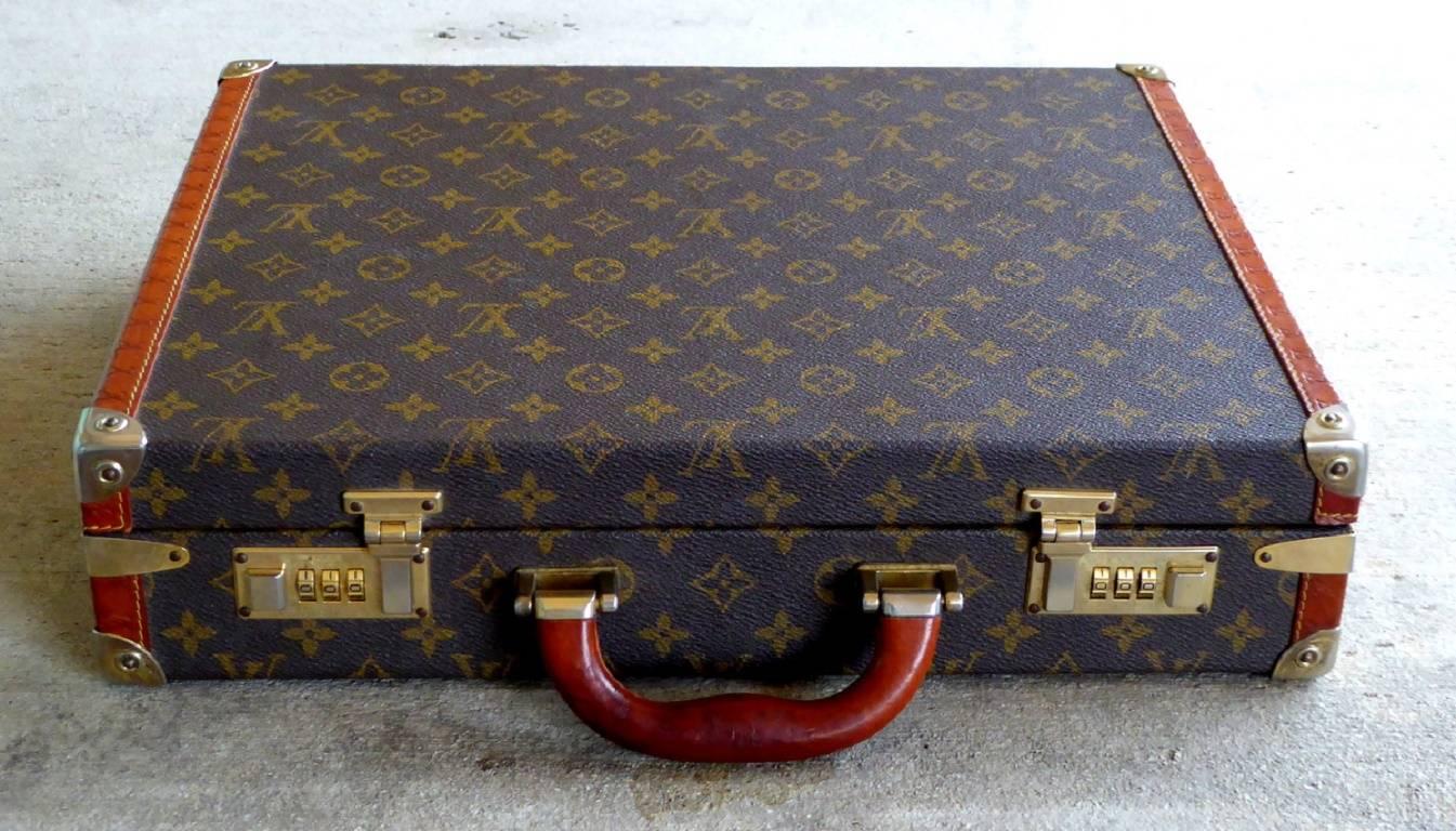 A handsome Louis Vuitton briefcase with combination lock, in very nicely weathered condition.

(Please note: We try to respond to messages within minutes, but in no event does it take more than a few hours. If you haven't received a reply to your