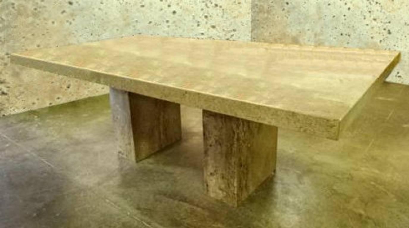 An impressive double-pedestal dining table by Stone International for Robb & Stucky. Made in Italy of marble in a variety of putty colors. We love that the stone 