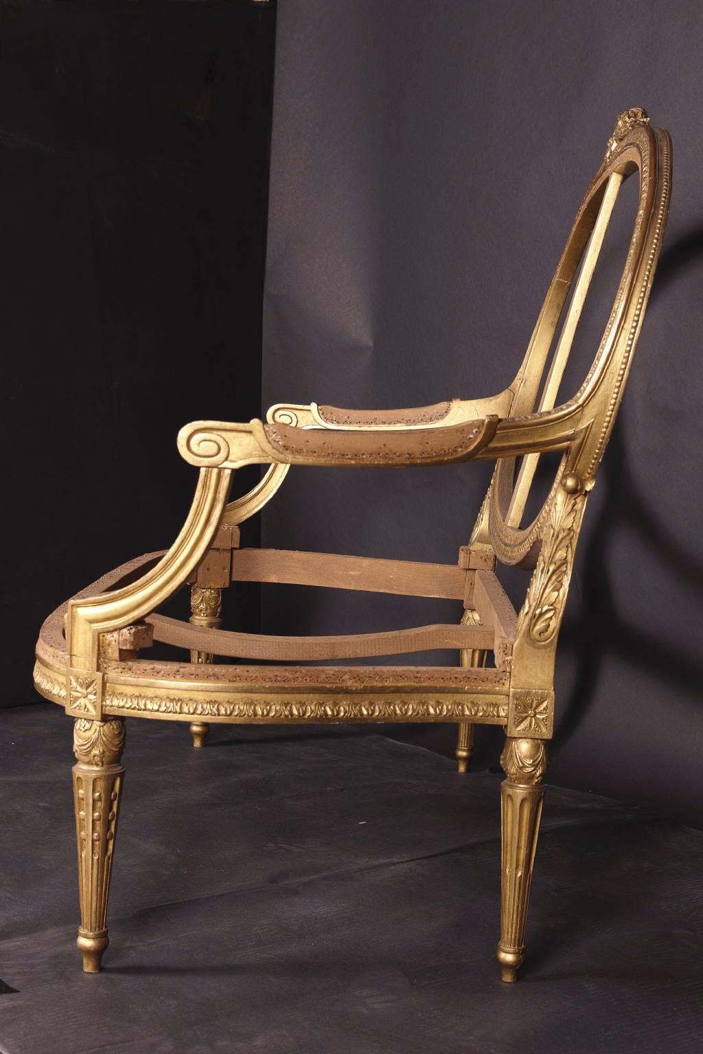 From the 19th century, this sofa frame was hand-carved and then painted with gold leaf by hand. The frames are ready to be upholstered by the purchaser, an excellent opportunity to match the upholstery of other furniture, or the color scheme of a