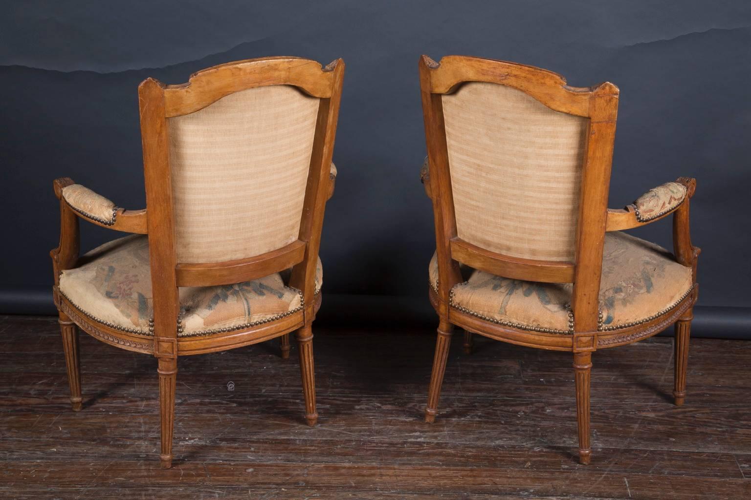 Pair of 19th century Louis XVI Walnut Armchairs with Original Petit-Point In Good Condition For Sale In New Orleans, LA