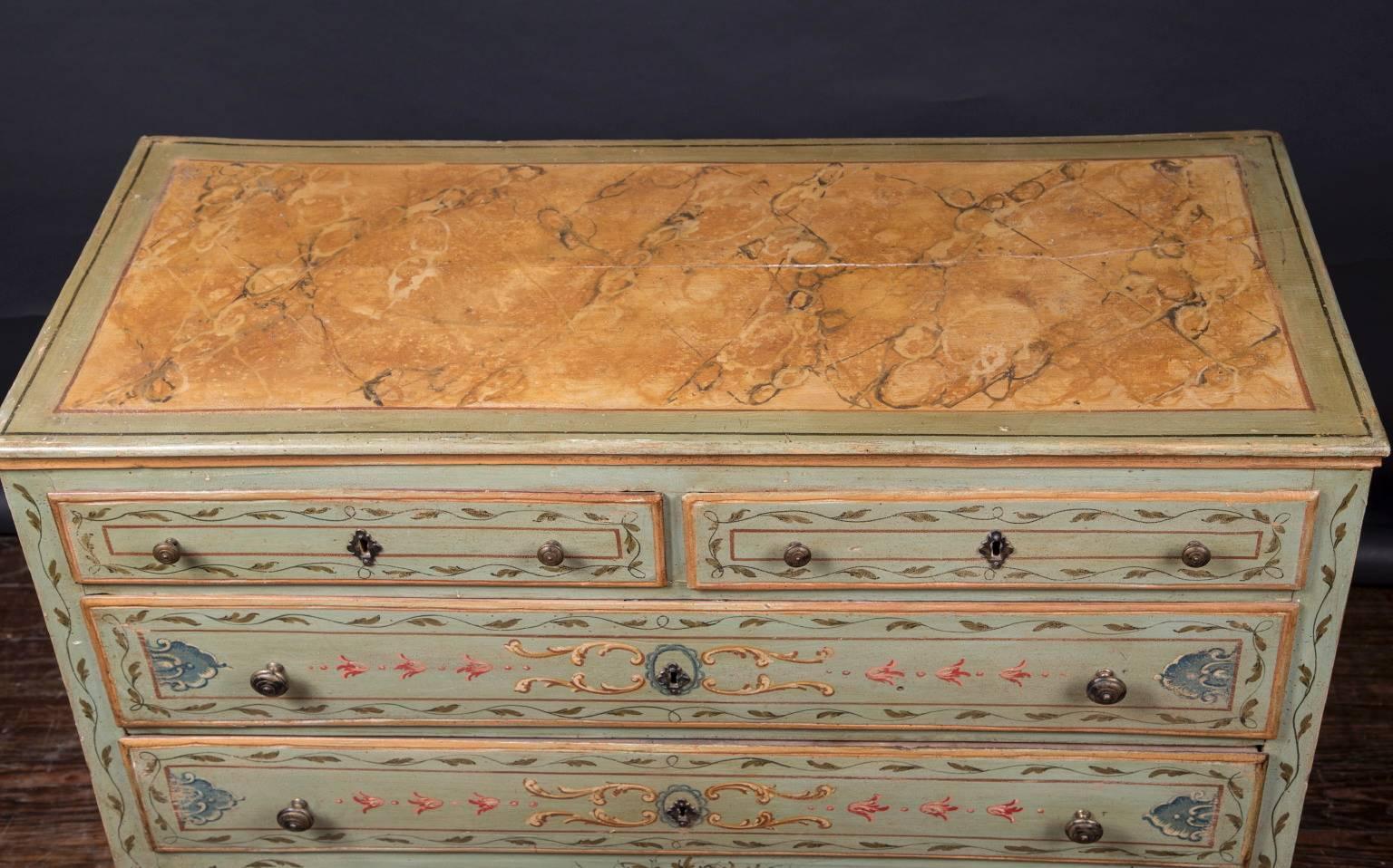 This beautiful Louis XV style painted chest features bronze knobs and escutcheons on each of four drawers.  The Italian antique chest dates back to the 19th century and is painted in a floriate design on front and sides, trimmed with gold edging,