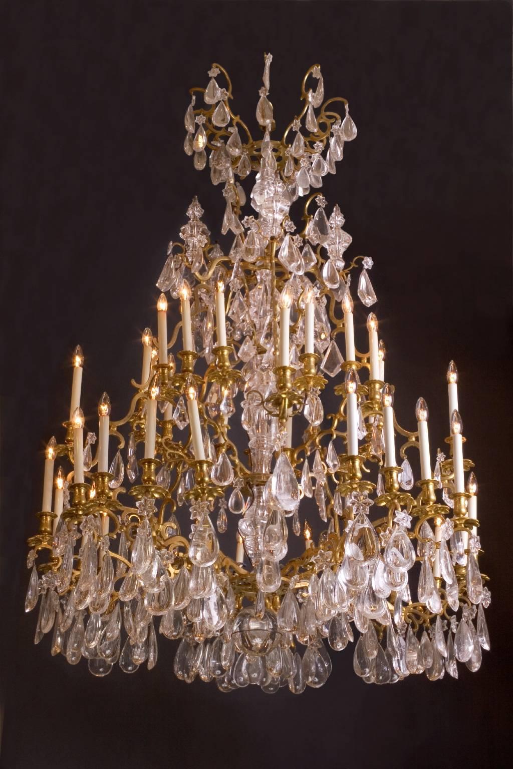 This absolutely magnificent chandelier was made in the 19th century from bronze doré and exquisitely clear rock crystal. Rock crystal is made from quartz mined from the ground, and is usually quite cloudy. The higher quality the rock crystal, the