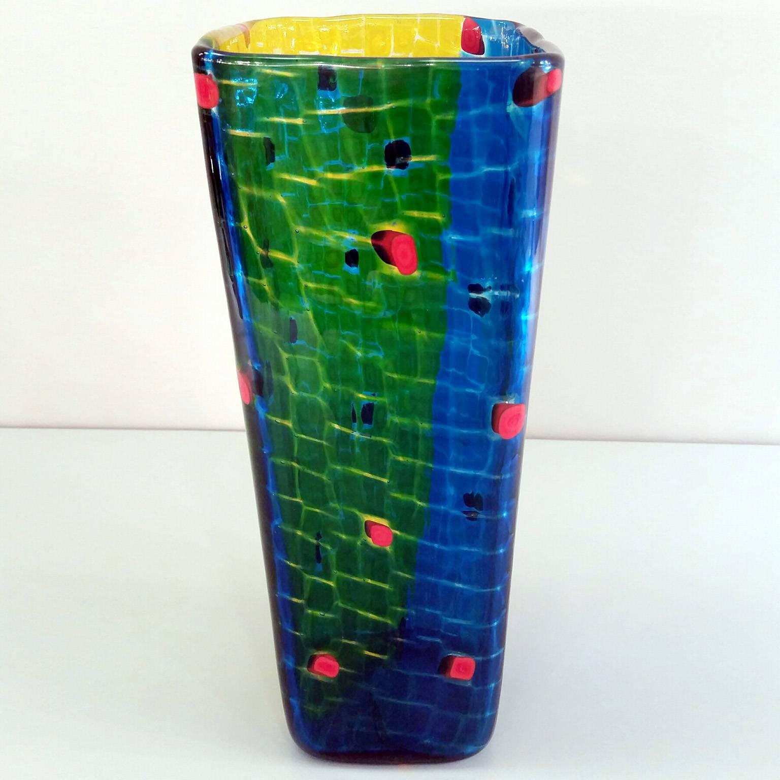 Handmade Murano blown-glass vase designed by Gianni Versace in the mid-1990s.
The vase is made of multicolored glass murrinas
Numbered edition.
Signature: Venini Gianni Versace 2002 / 7.
