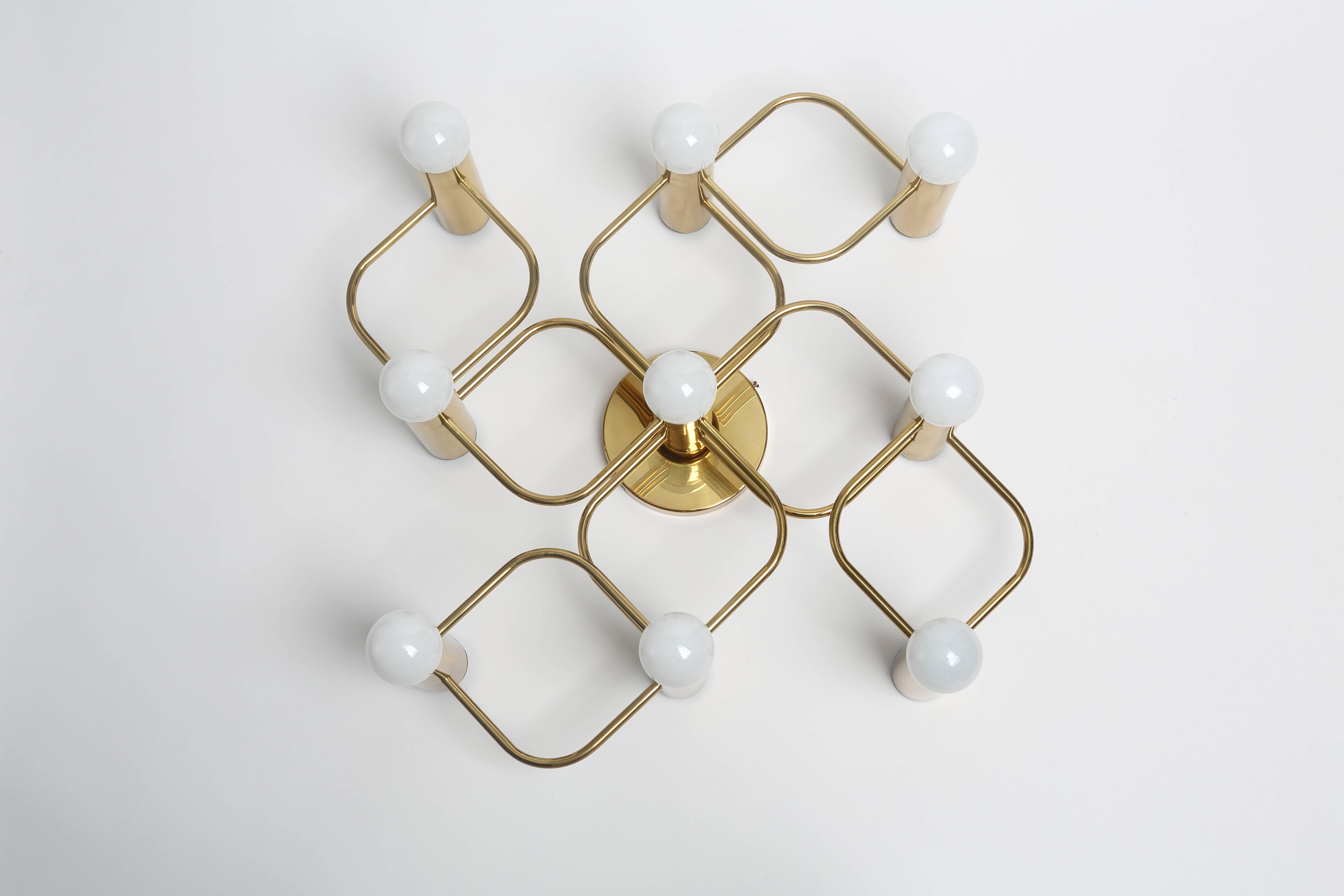 Sciolari style flush mount with nine lights.
Made with solid polished brass. Can be used as ceiling or wall light.