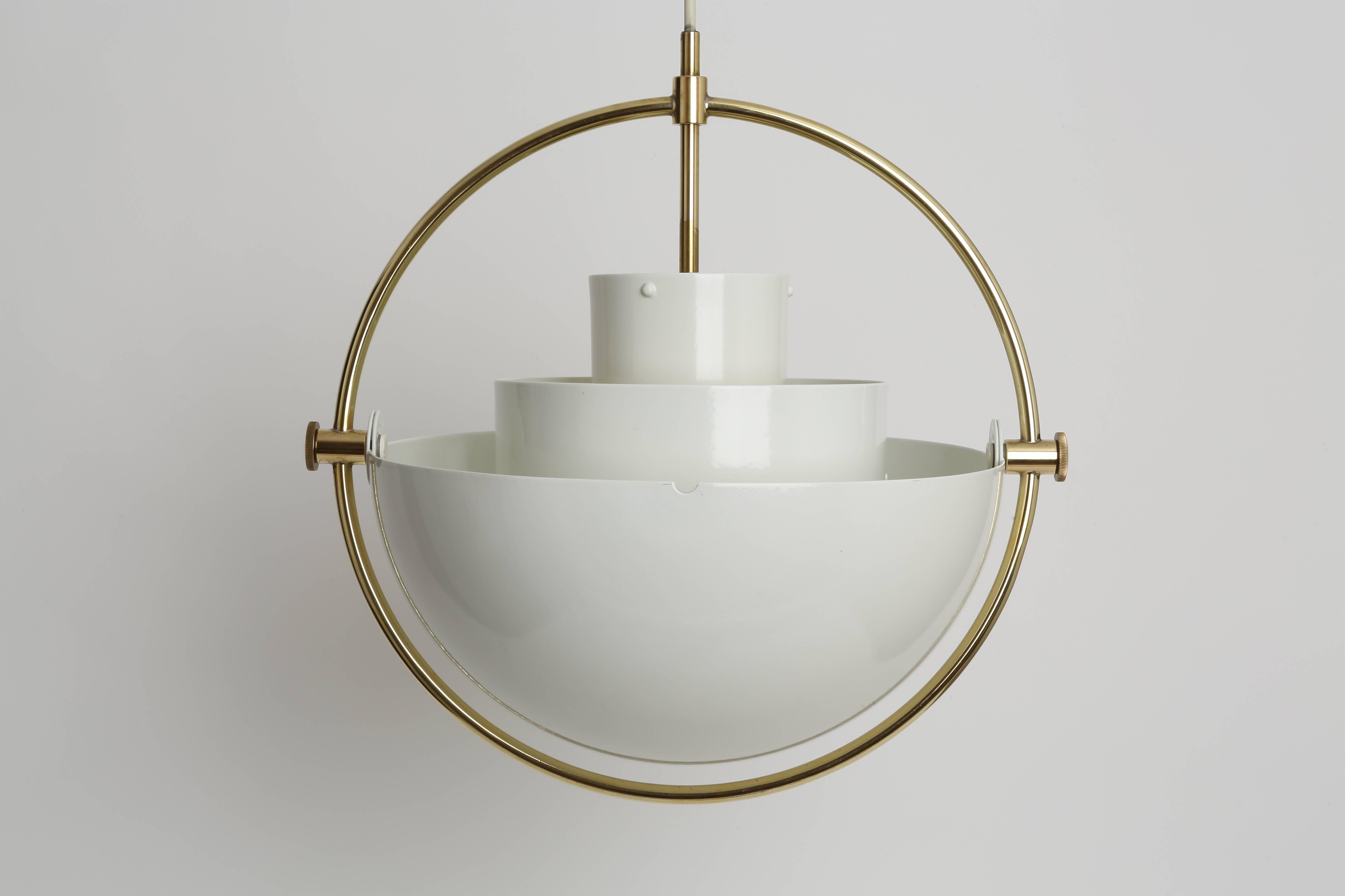 Multi-light ceiling pendant by Louis Weisdorf.
Very versatile pendant made out of brass and enameled metal.
Has one-light bulb.