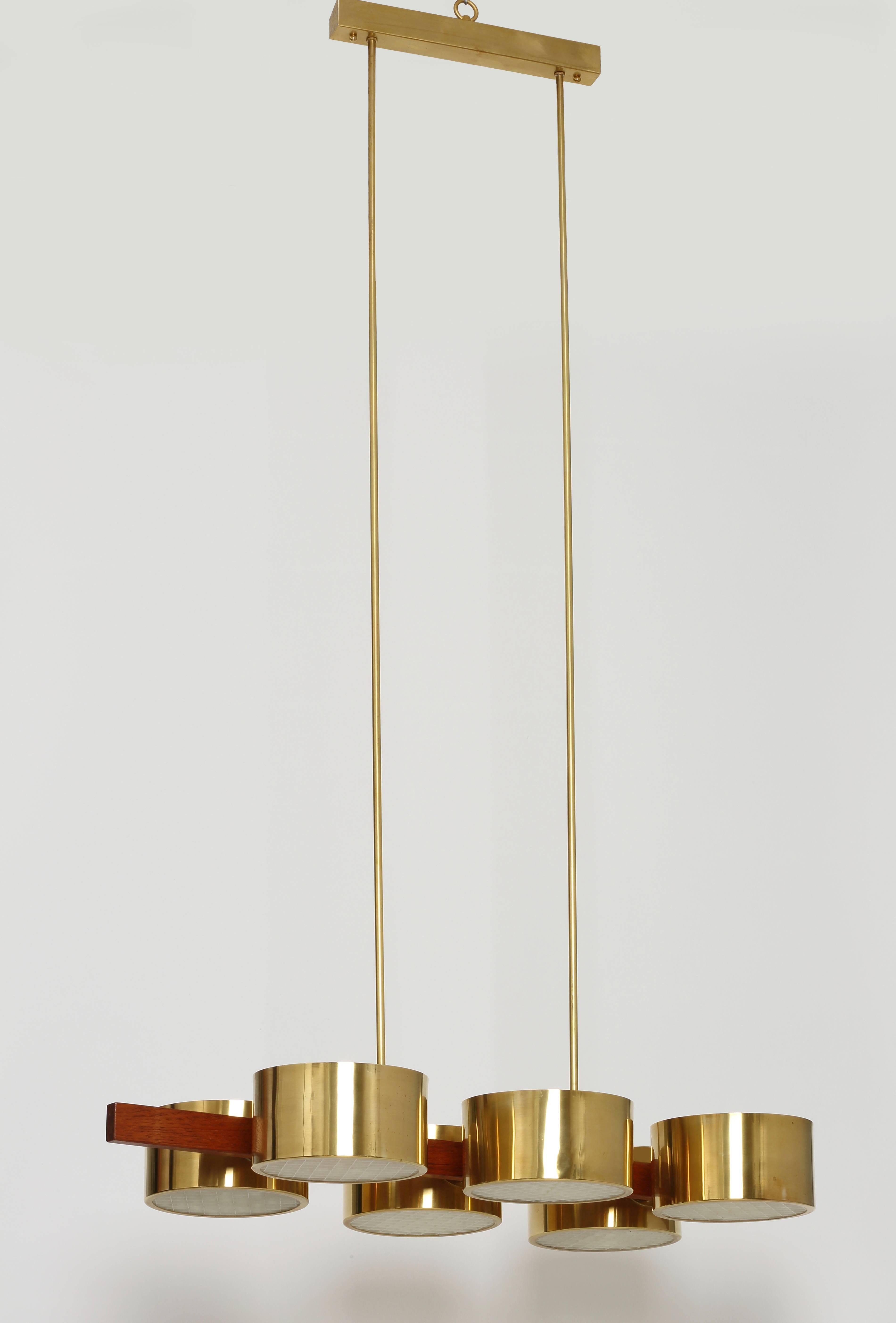 Hans Agne Jakobsson ceiling light. 
Made with brass and teak.
Acrylic diffusers. 2 fixtures available