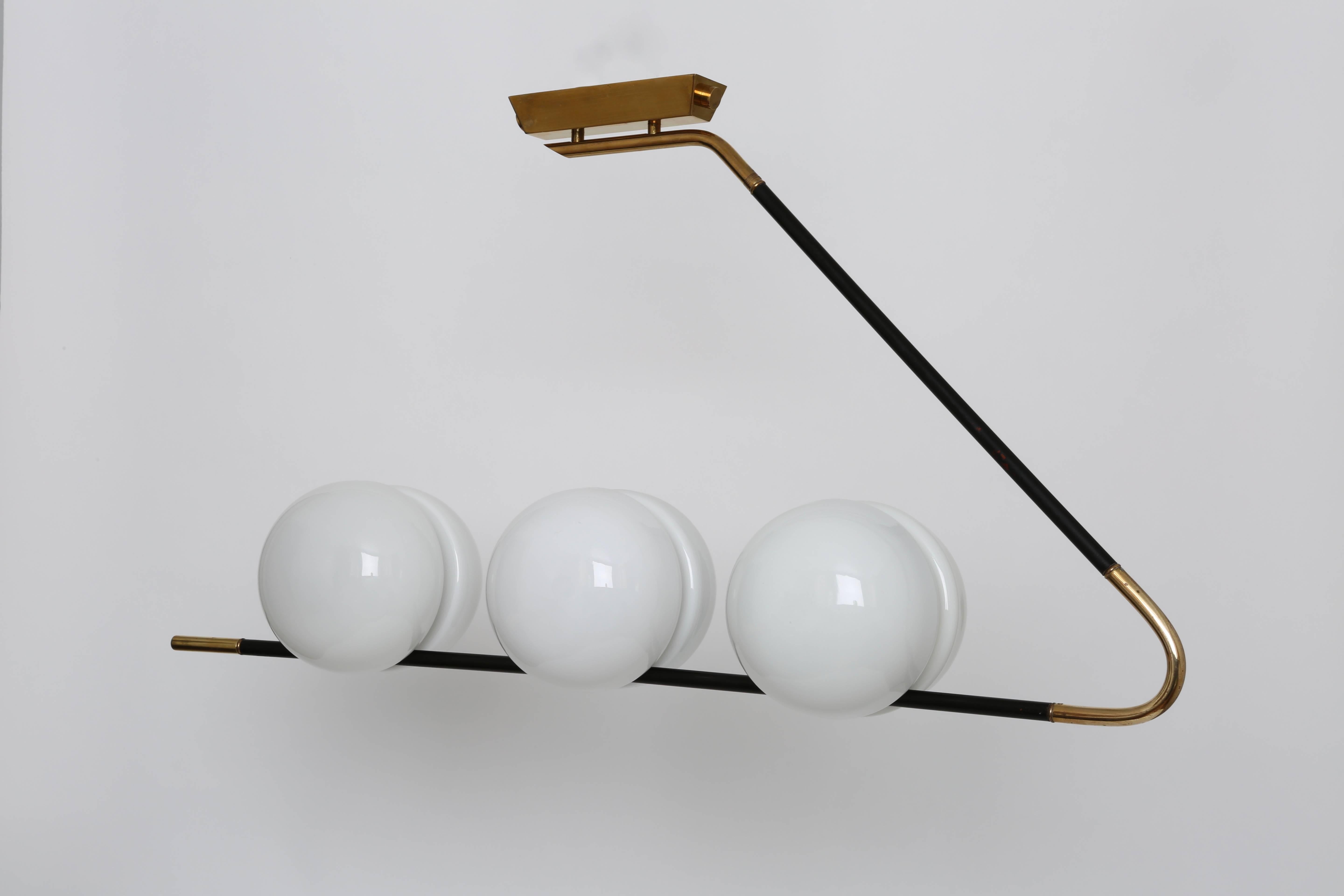 Chandelier by Maison Lunel.
Designed and made in France, 1950s.
Six opaline glass demi globes. 
Takes 6 candelabra bulbs.
Complimentary US rewiring upon request.
Can also be used as wall light.

We take pride in bringing vintage fixtures to their