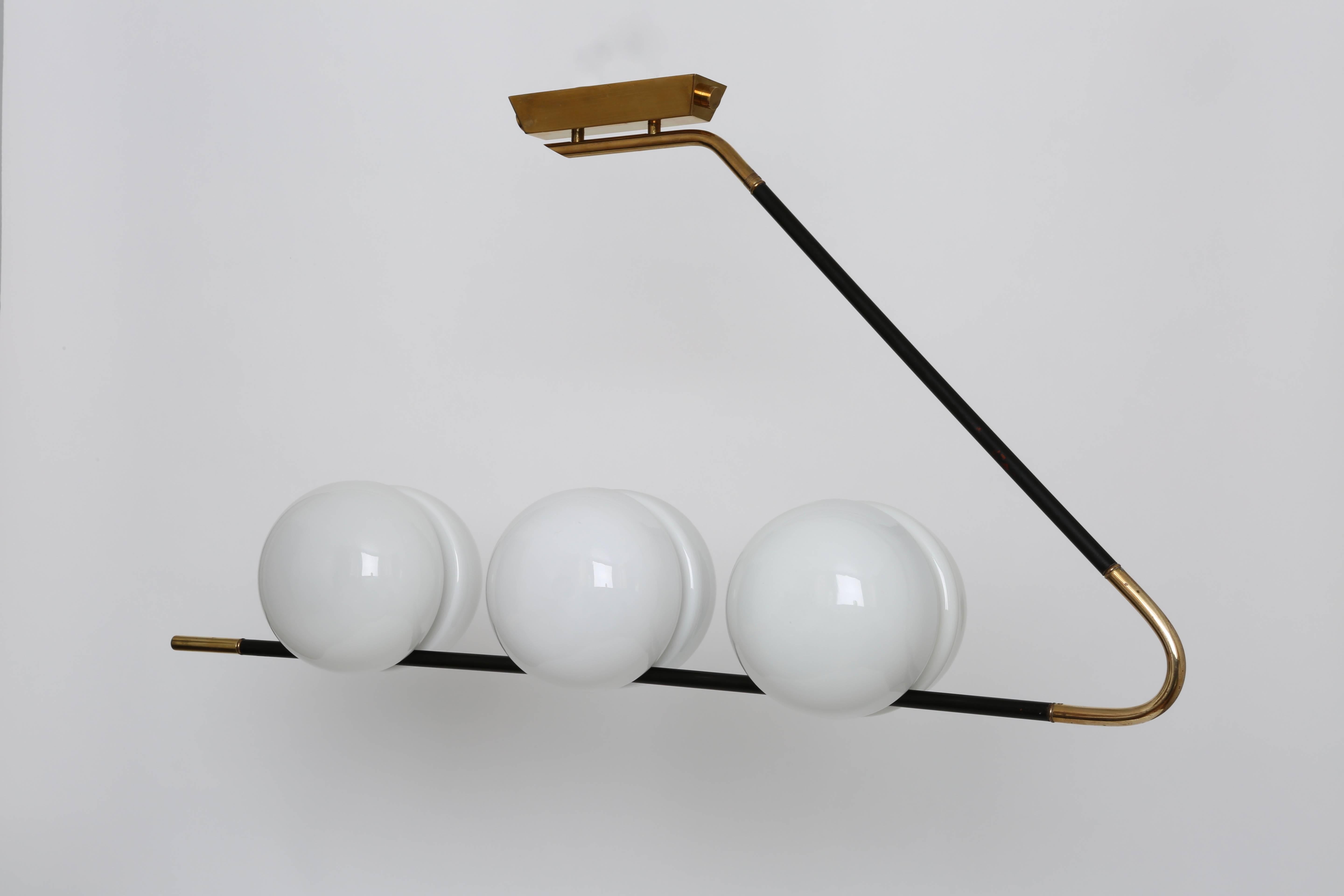 Chandelier by Maison Lunel.
Six opaline glass globes. 
Can also be used as wall light.