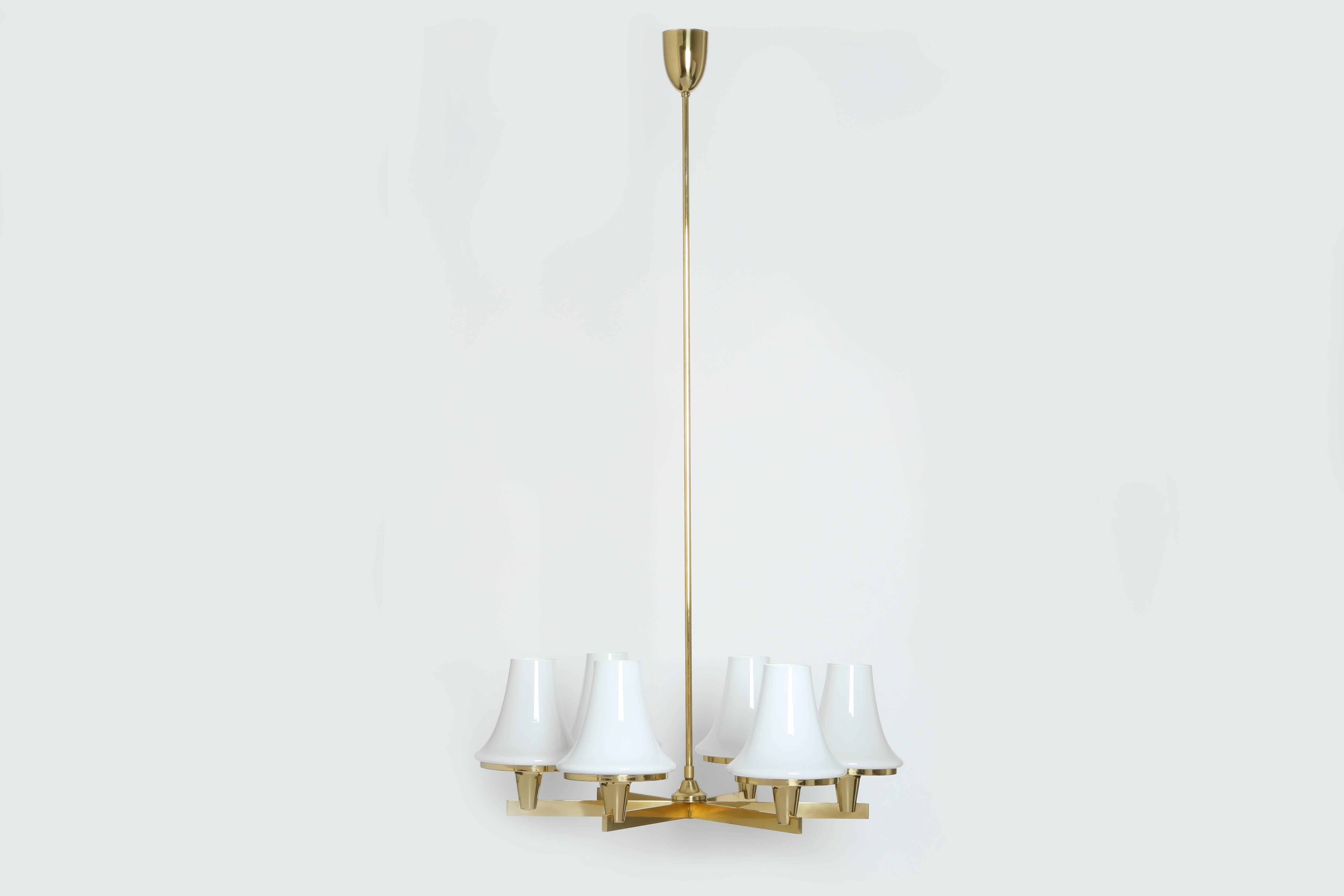 Hans-Agne Jakobsson chandelier.
Six branches holding large glass bells.
Sweden 1960s.
Matching table lamp available.