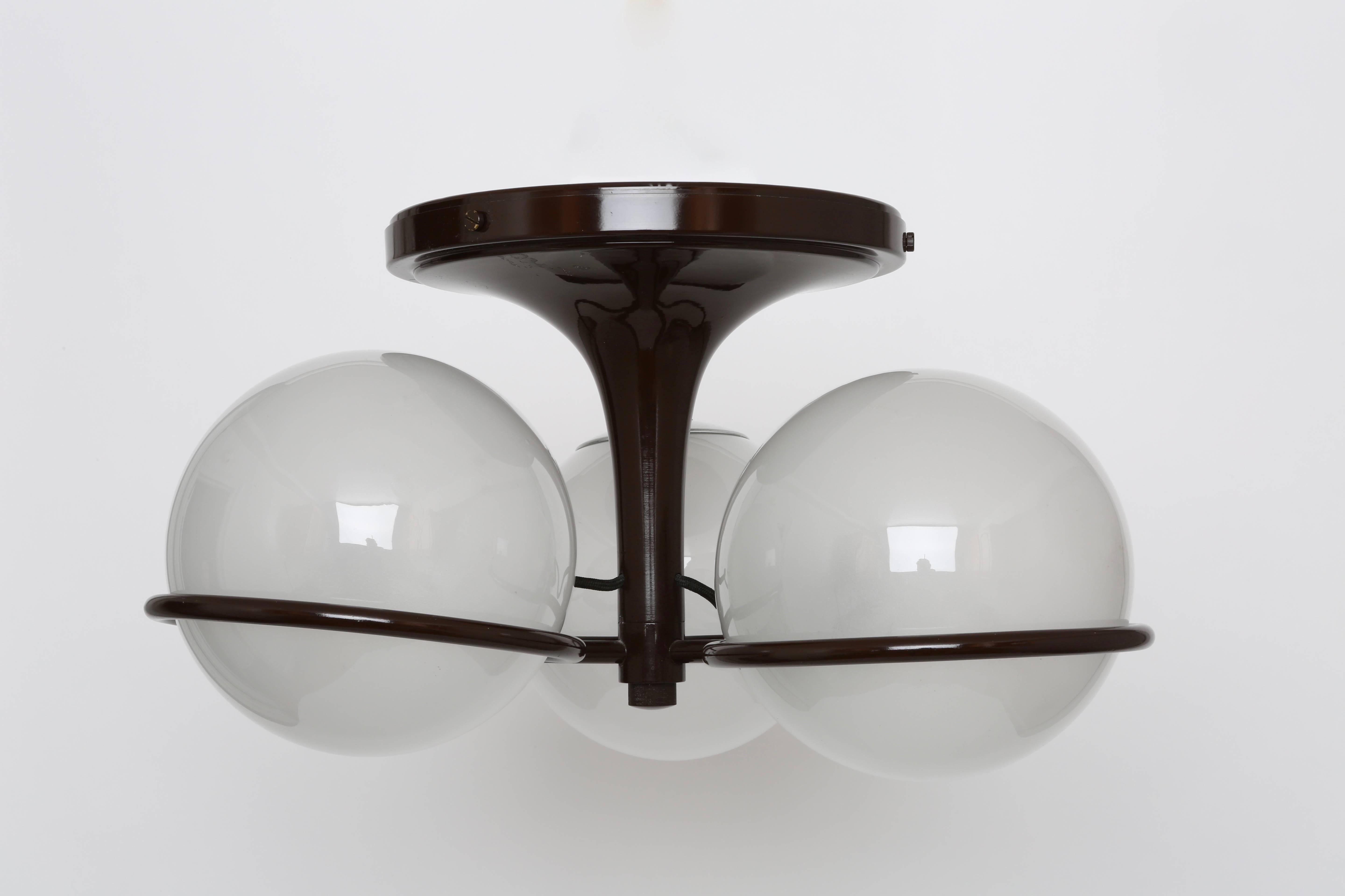 Gino Sarfatti lighting fixture for Arteluce.
Model 2042/3.
Frosted Murano glass globes and dark brown lacquered metal.
Italy, 1960s.
 