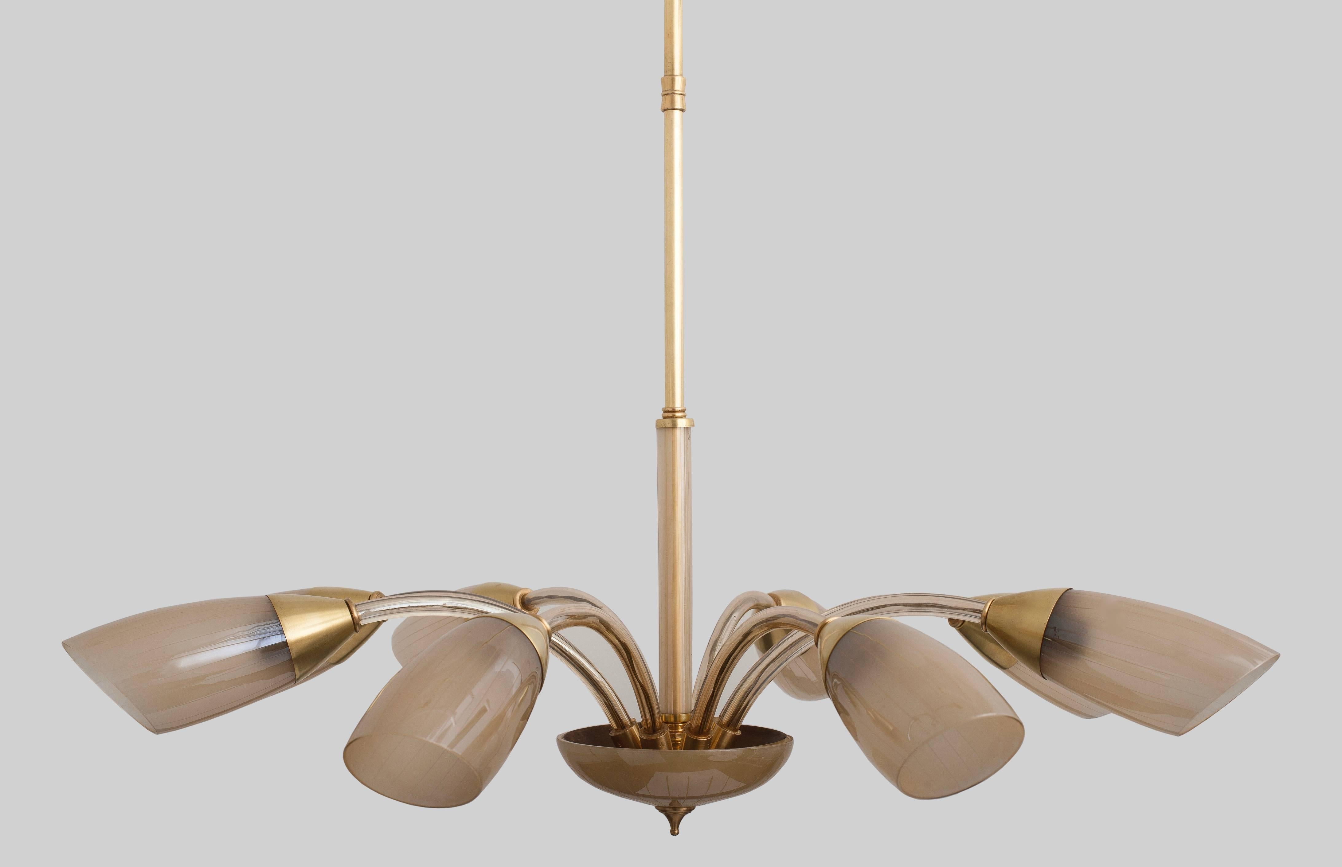 Italian chandelier with eight arms.
Made with glass and brass.
