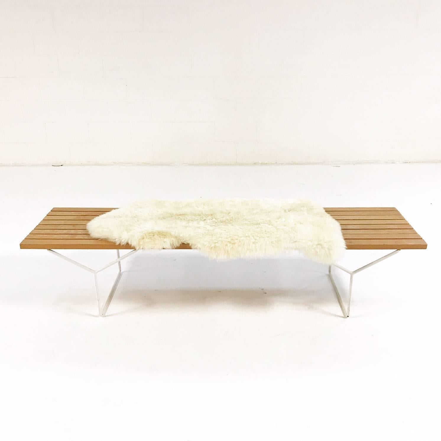 Vintage early Harry Bertoia for knoll slat bench, model number 400 with Brazilian sheepskin

This is a very cool vintage, circa 1952 Harry Bertoia for Knoll Slat Bench, Model number 400. We added one of our beautiful Brazilian sheepskins for a