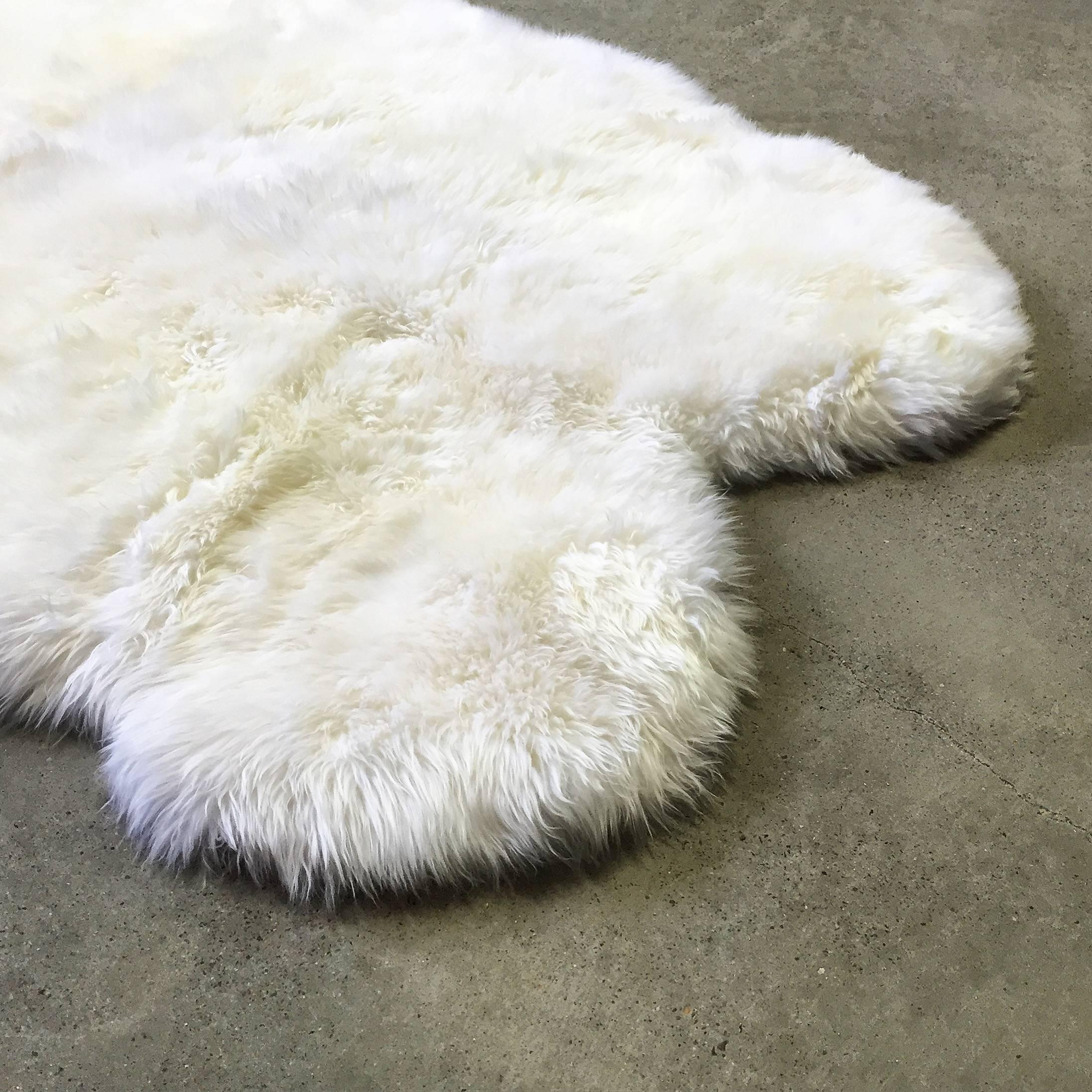 The naturalness and softness of a sheepskin rug can quickly elevate a room's beauty. The quad size is perfect as a cozy rug in any room of the house. We hand-select our beautiful rugs from the finest New Zealand sheepskin. Each rug meets our very