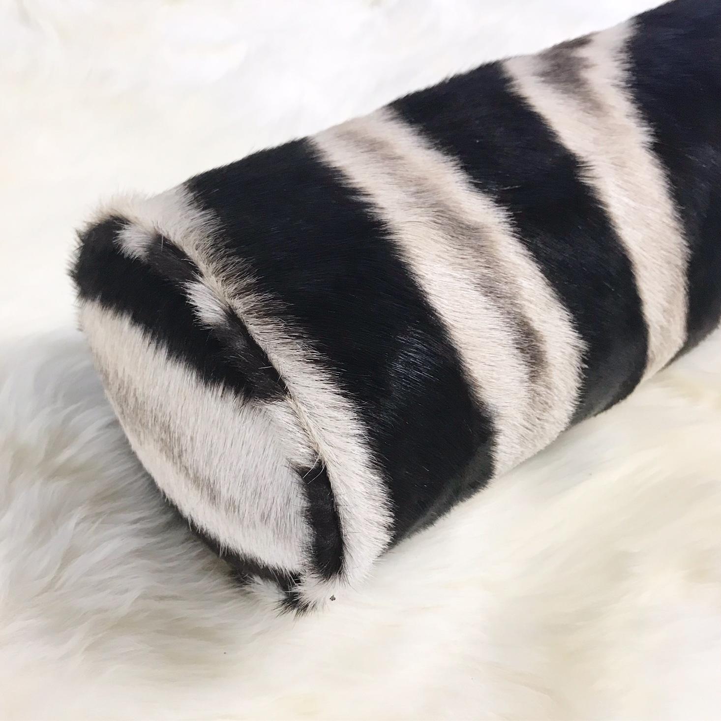 Forsyth zebra hide pillows are simply the best. The most beautiful hides are selected, hand cut, hand-stitched, and hand stuffed with the finest goose down. Each step is meticulously curated by Saint Louis based Forsyth artisans. Every pillow is a
