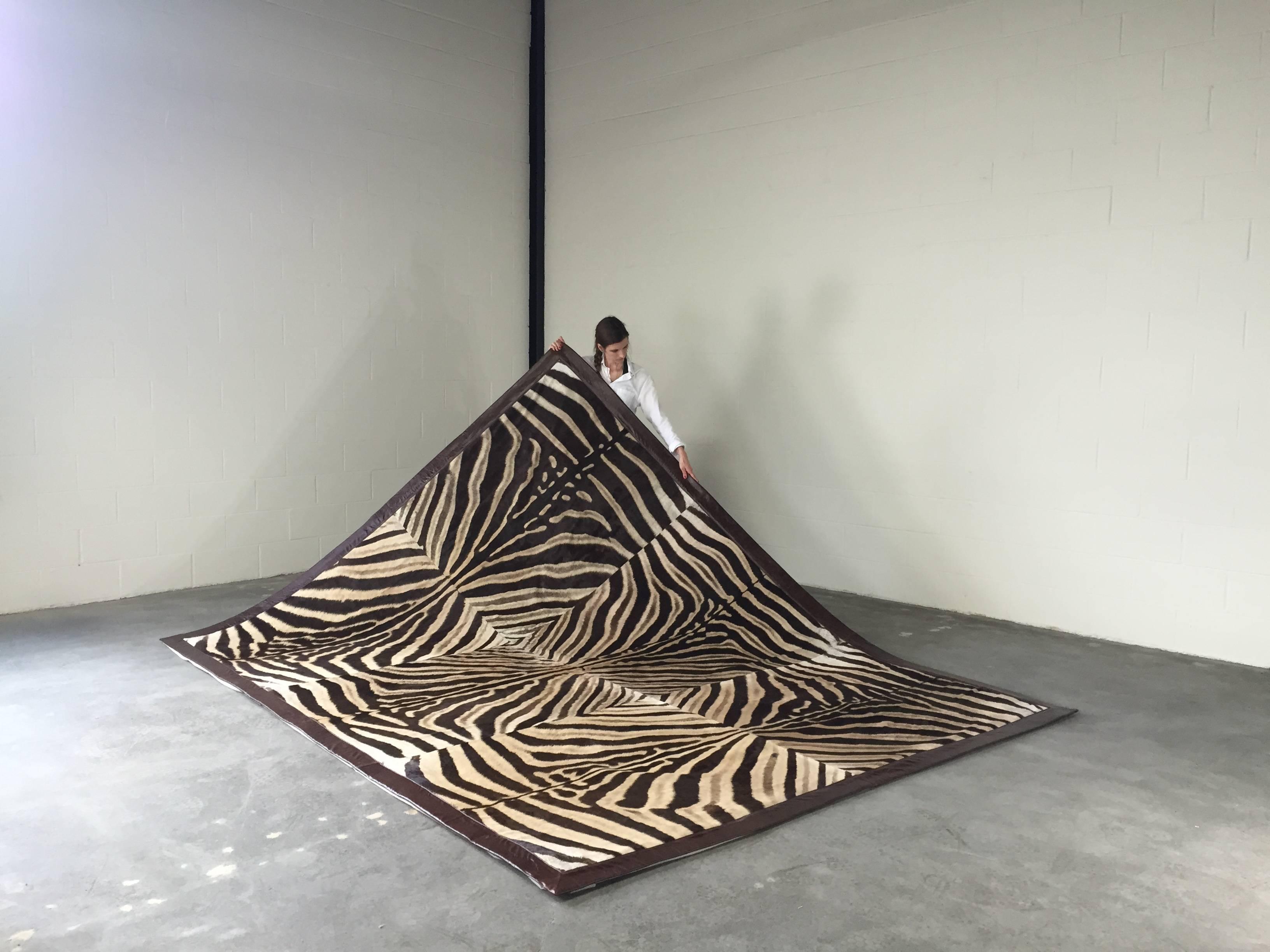 The Forsyth design team examined hundreds of zebra hides to perfectly match six beautiful hides for this amazing one of a kind rug. The natural stripe patterns create a truly breathtaking work of modern art.

Each hide is hand-cut and