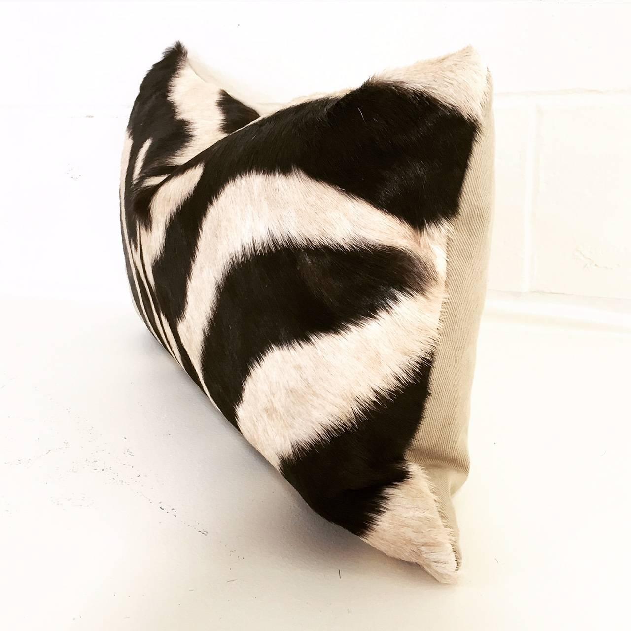 Forsyth zebra hide pillows are simply the best. The most beautiful hides are selected and hand cut, hand stitched and hand stuffed with the finest goose down. Each step is meticulously curated by Saint Louis based Forsyth artisans. Every pillow is a