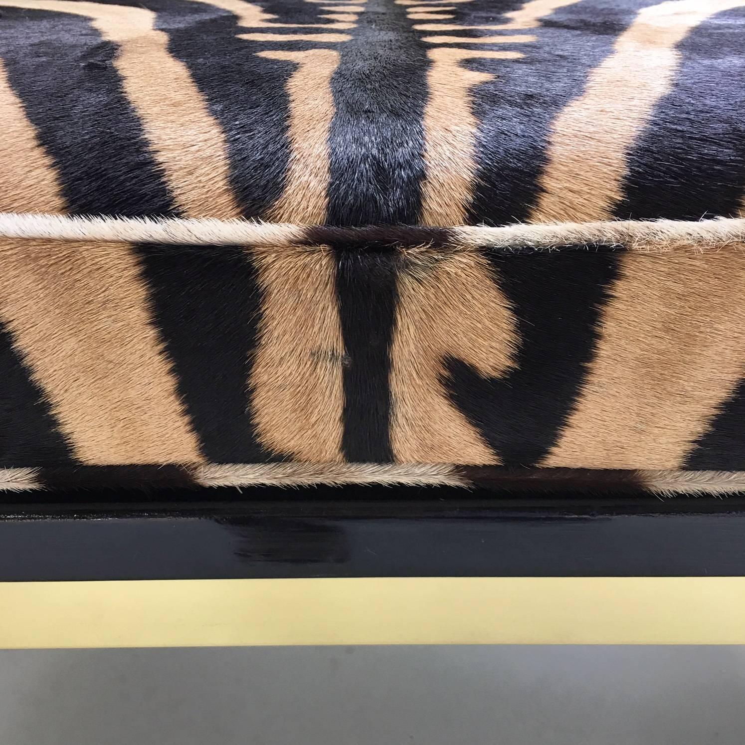Pair of Knoll Style Zebra Hide and Brass Ottomans 1