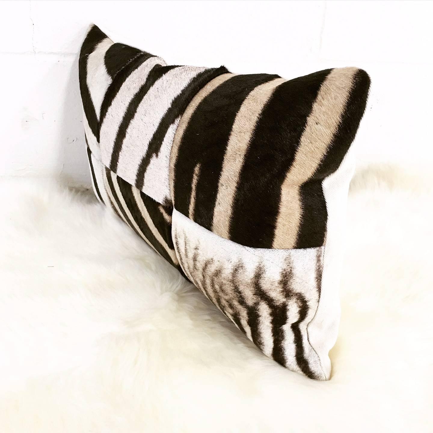 Forsyth zebra hide pillows are simply the best. The most beautiful hides are selected and hand-cut, hand-stitched and hand-stuffed with the finest goose down. Each step is meticulously curated by Saint Louis based Forsyth artisans. Every pillow is a