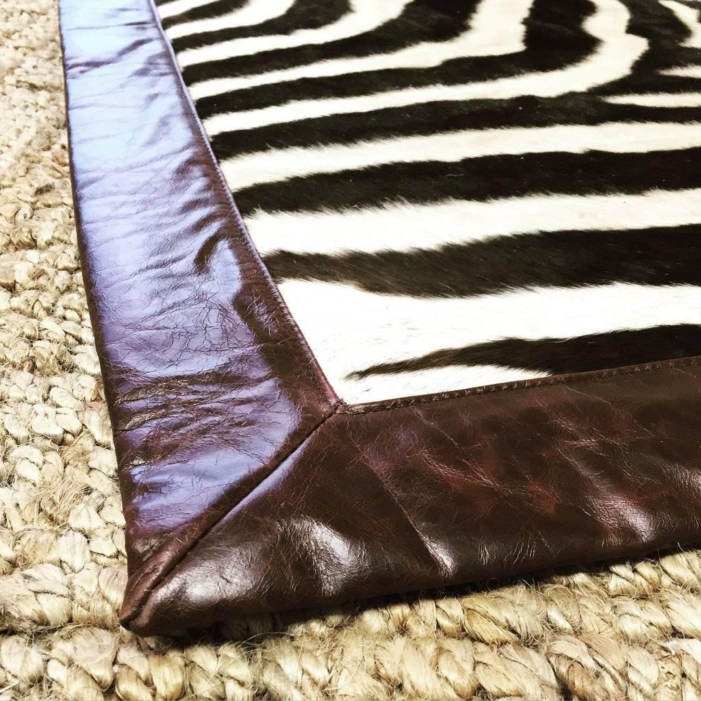 Wild yet refined. The Forsyth design team examined hundreds of zebra hides to perfectly match four beautiful hides for this amazing one of a kind rug. The natural stripe patterns create a truly breathtaking work of modern art. 

Each hide is