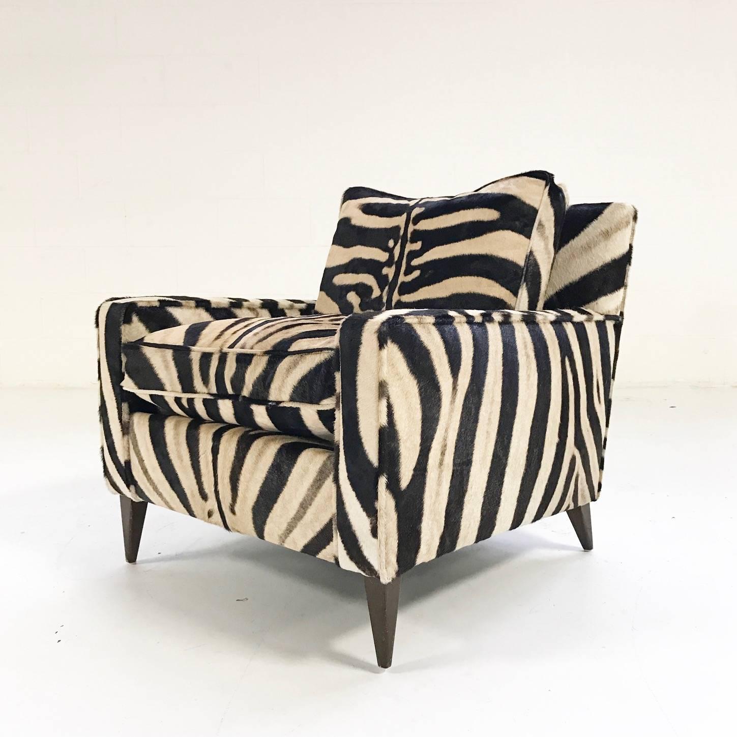 Paul McCobb's modern take on traditional pieces makes him a favourite among American mid-century designers. Completely reconditioned and masterfully reupholstered in zebra hide, this McCobb lounge chair is ready and waiting for your beautiful room.