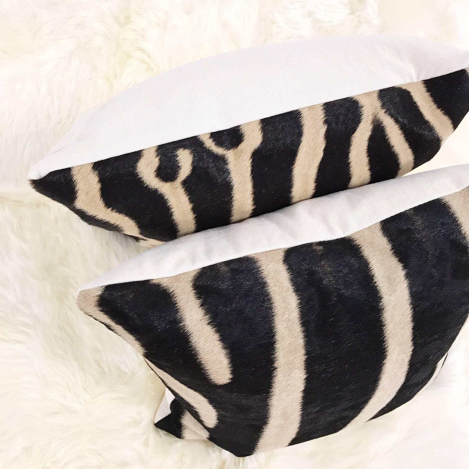 Forsyth zebra hide pillows are simply the best. The most beautiful hides are selected and hand cut, hand-stitched and hand stuffed with the finest goose down. Each step is meticulously curated by Saint Louis based Forsyth artisans. Every pillow is a