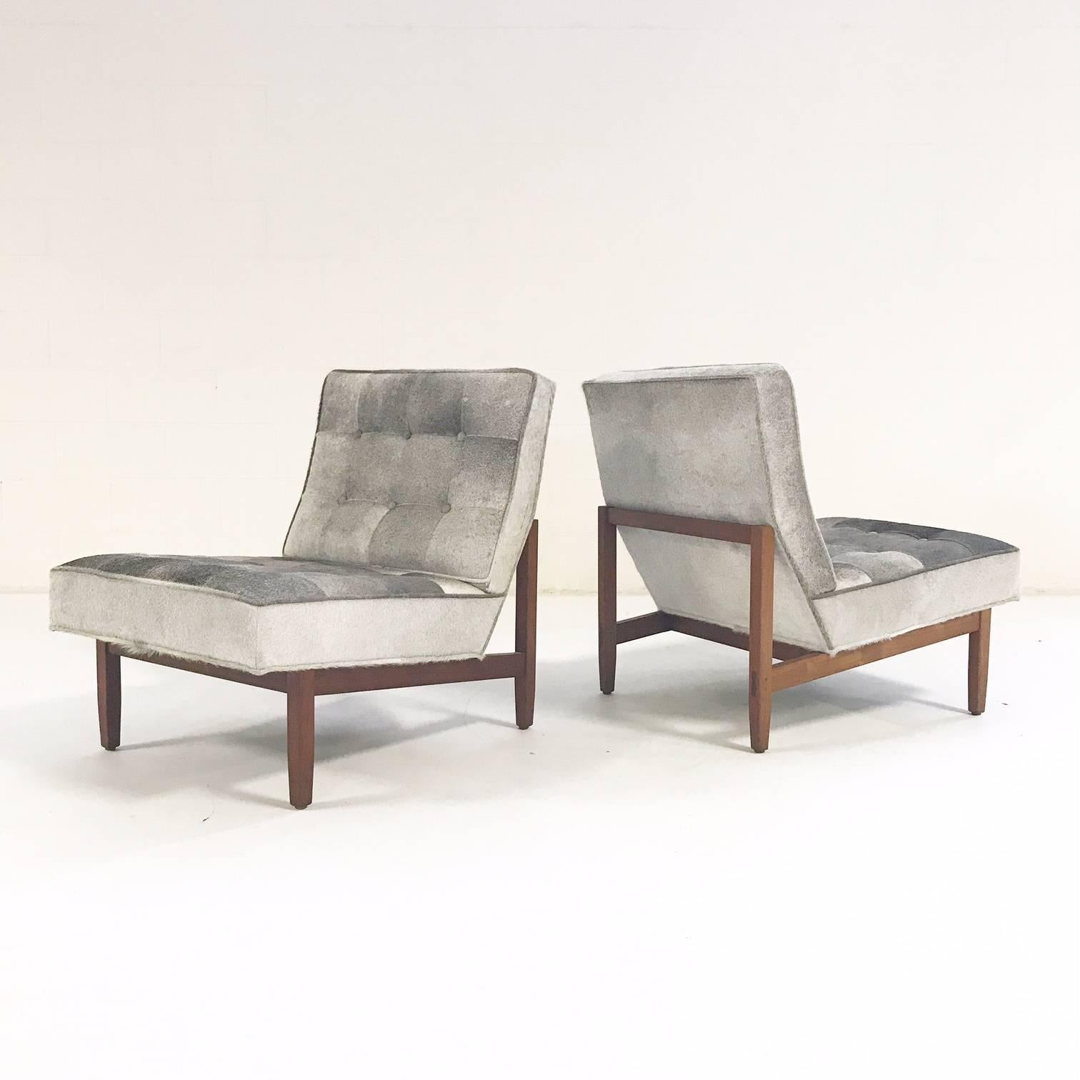 This Florence Knoll design is iconic. We love the architectural lines and geometric profile. We gave our master upholsterers a big job to do with this pair. We wanted them to mimic the tufted patchwork so famous in Knoll upholstered furniture. We
