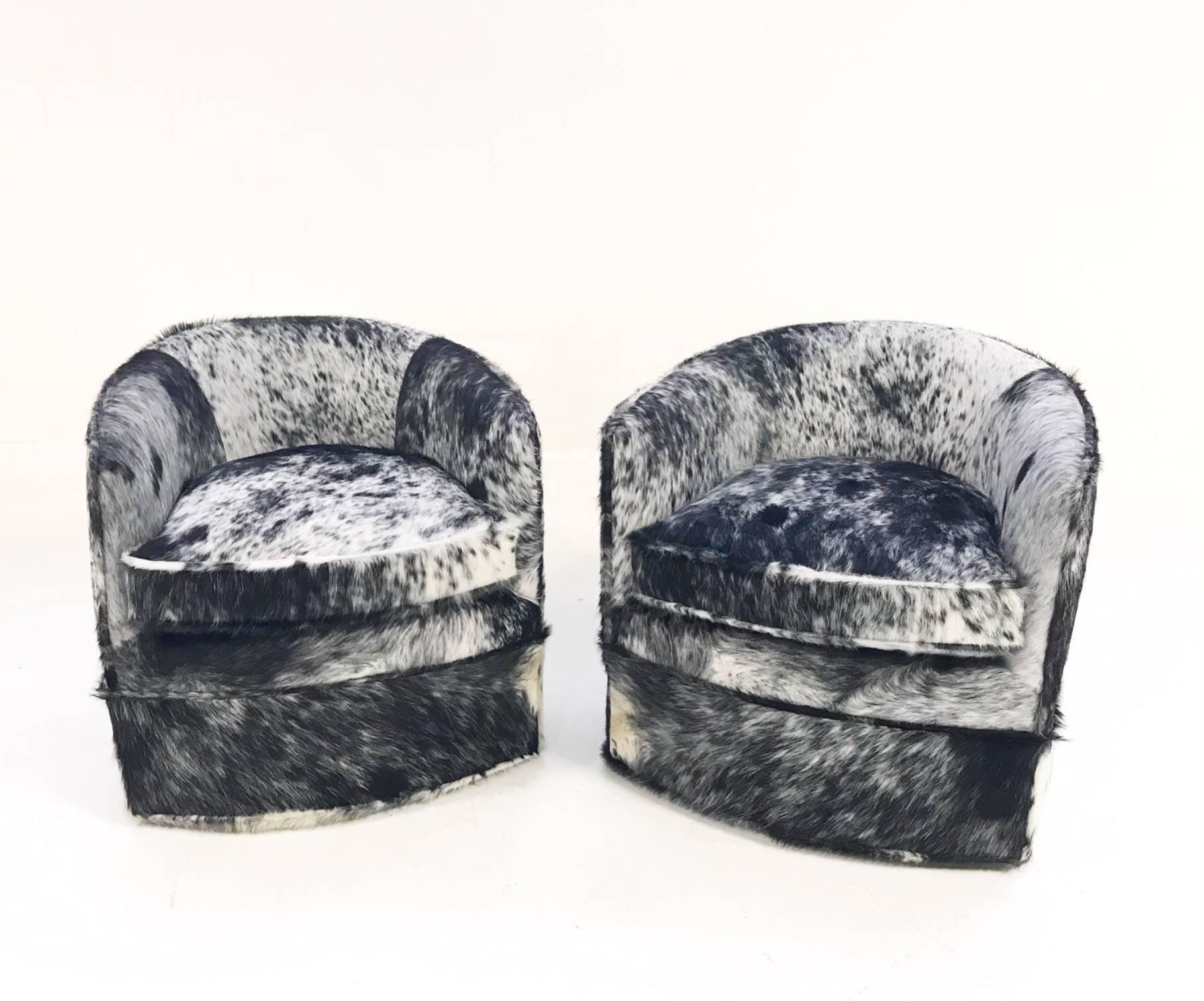 This pair of Milo Baughman swivel chairs are so special, circa 1980. Their petite size make them perfect for additional seating in rooms or as side chairs in hallways. Our master upholsterers completely restored adding brand new foam for structure