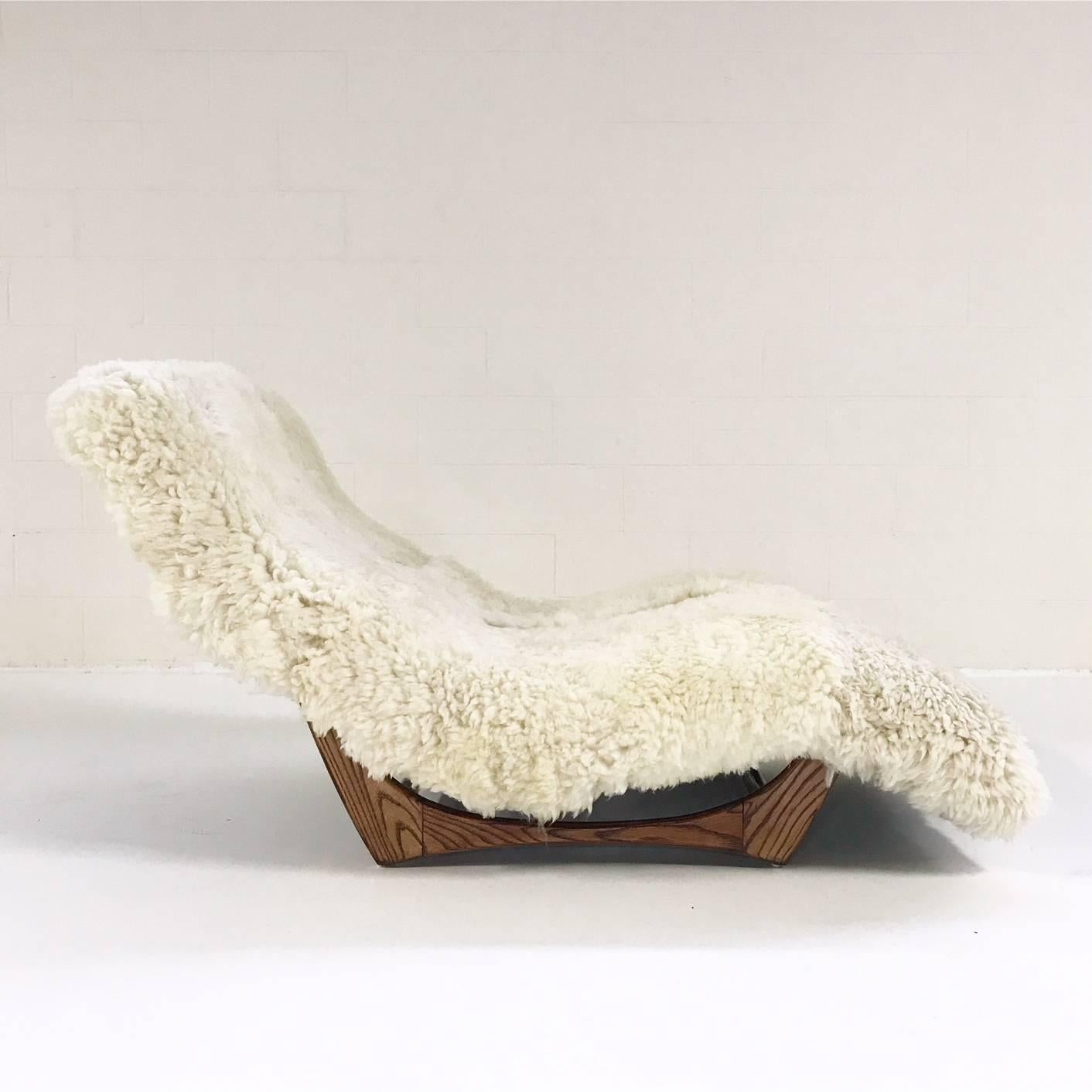This is an original wave chaise longue in the style of Adrian Pearsall. Adrian Pearsall began his career as an architect but dabbled in furniture design, quickly becoming a leader in the modernist furniture movement. We upholstered the lounge in our