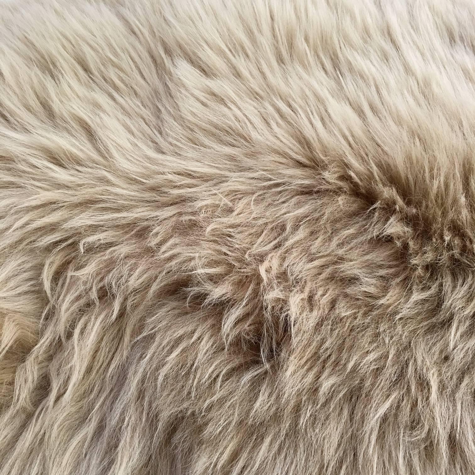 The naturalness and softness of a sheepskin can quickly elevate a room's beauty. On the floor, thrown over chairs and couches, this versatile design piece is a favorite of the Forsyth design team. We hand-select our beautiful rugs from the finest