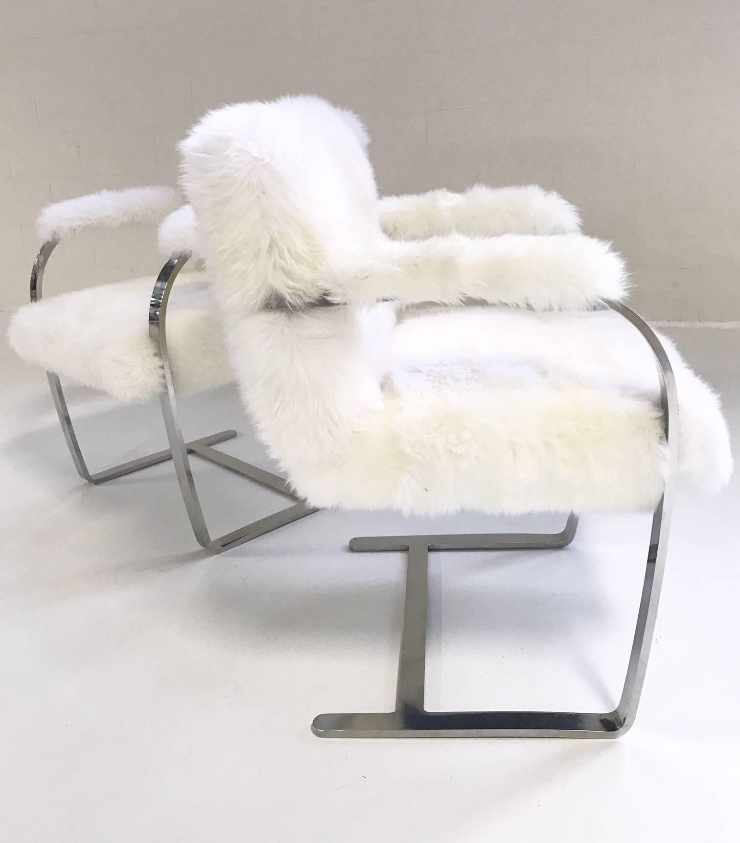 A German born designer, Mies Van Der Rohe originally designed this chair for his renowned Tugendhat House in Brno, Czech Republic.  It was later produced by Knoll.  We hand-selected the cozy ivory New Zealand sheepskin to complement the clean lines