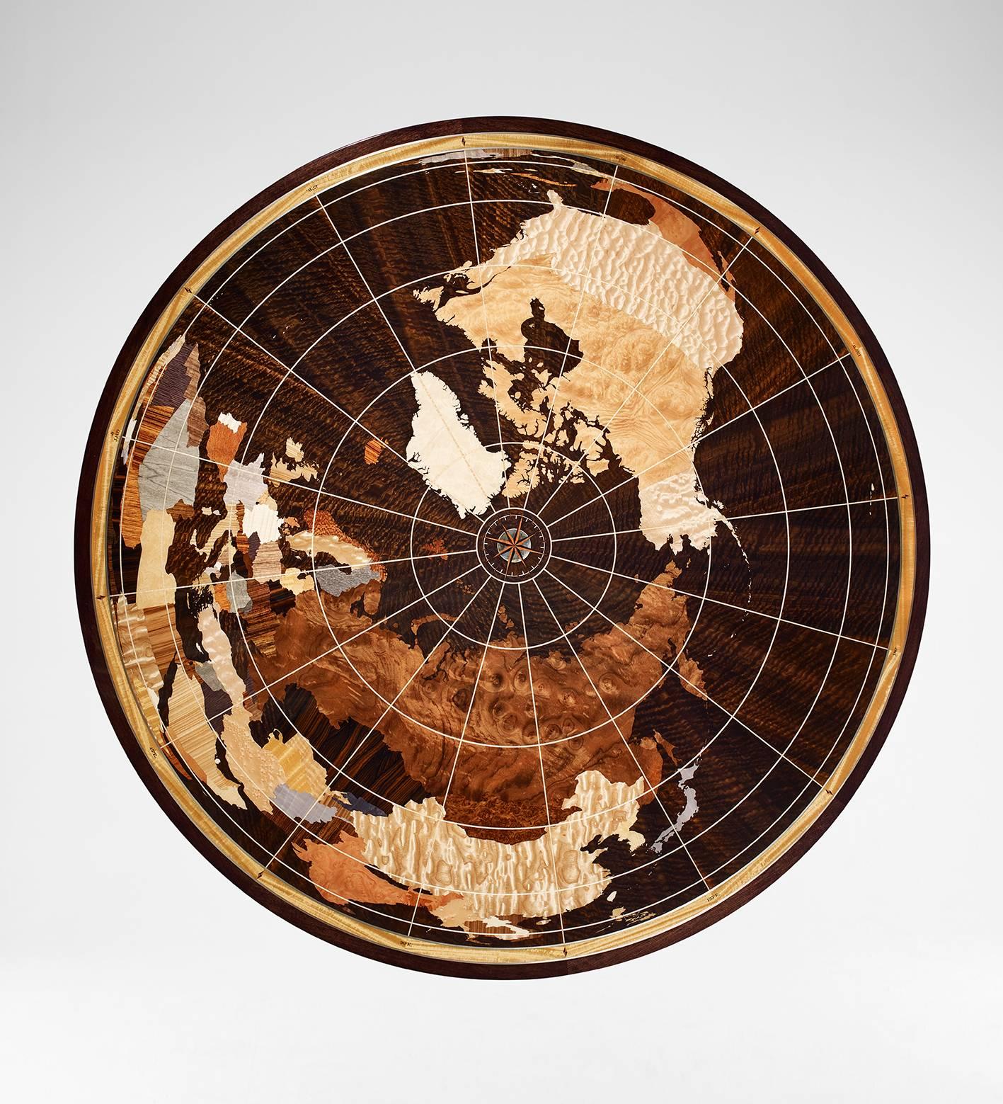 The unique Linley World Map table is hand-crafted by our specialist craftsmen in the UK using over 40 individually selected veneers.
The main body of the table is created out of stained Fulbeck walnut in a high gloss finish. The base features