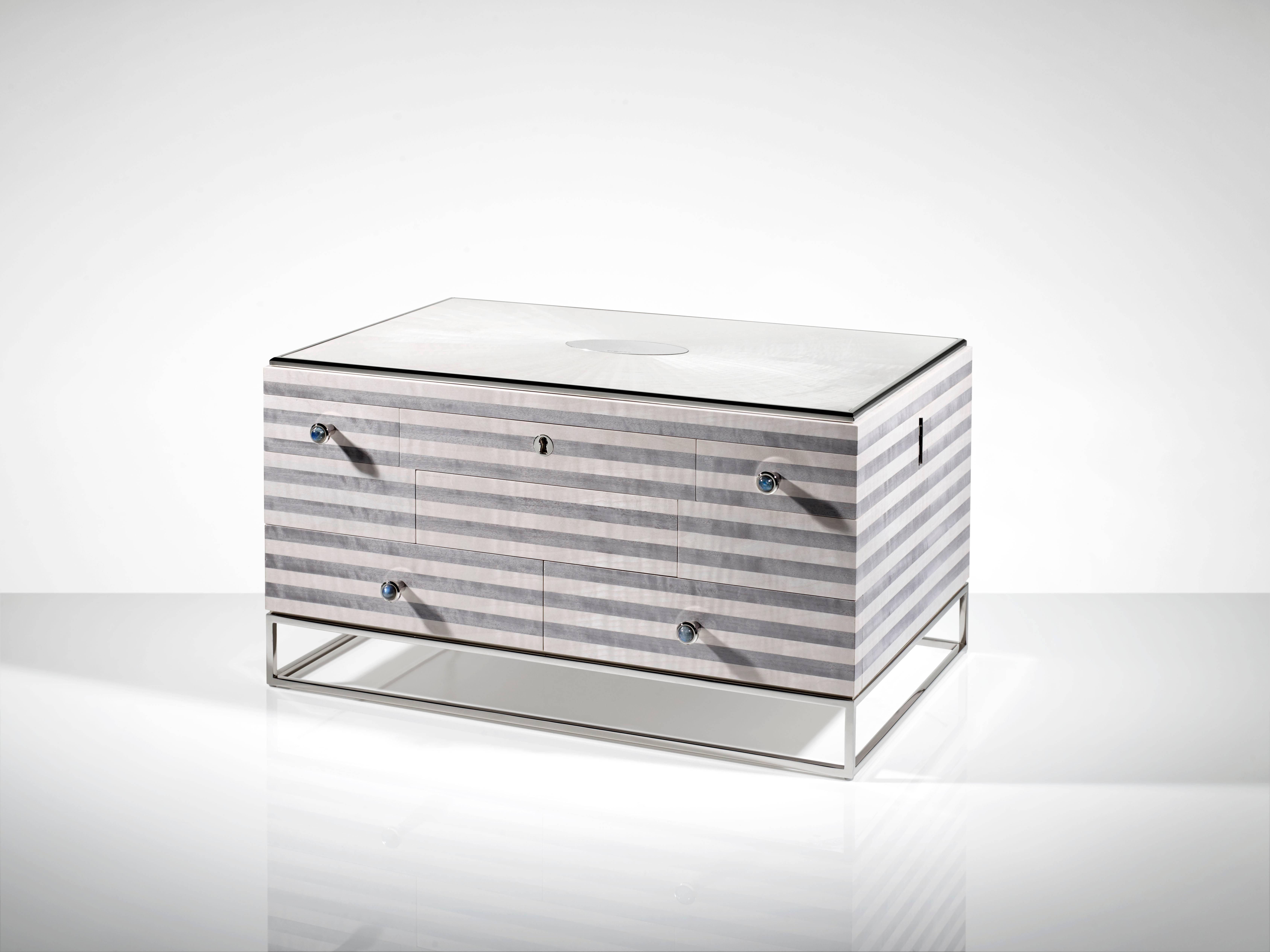 For its latest creation, a jewellery box, the Linley designers have taken inspiration from the magnificent stripe pattern adorning the interior of the Duomo of Siena. While the Duomo interior walls were created in alternating white and black marble