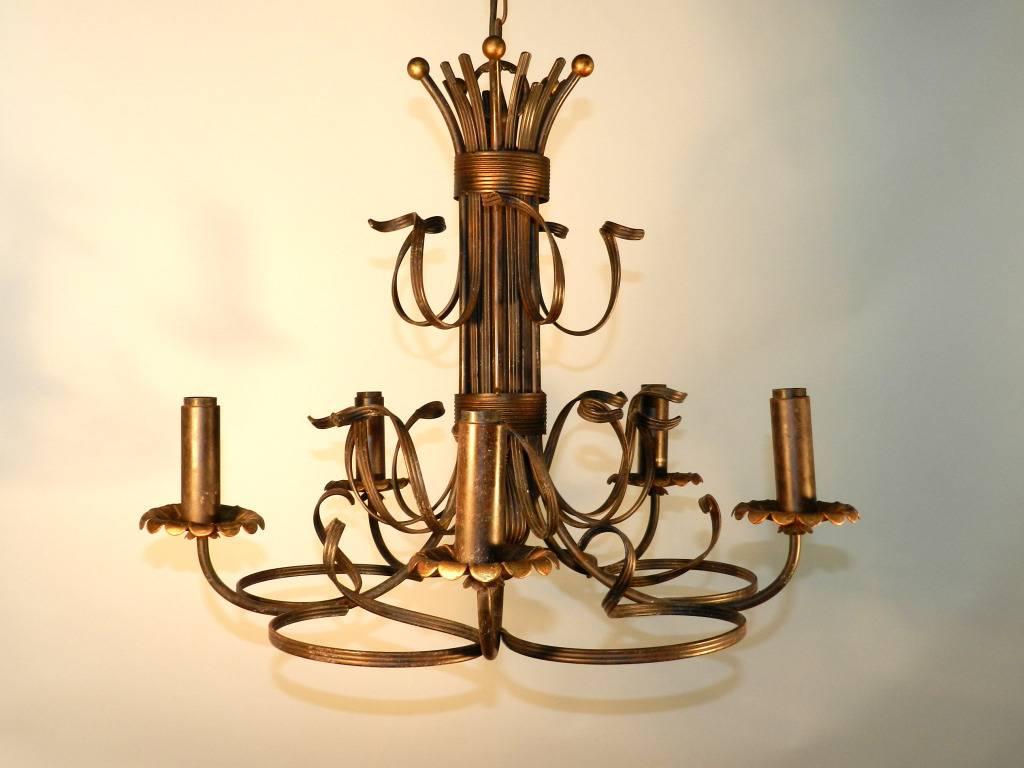 1950, Italian work, gilt and black lacquered wrought iron chandelier.
