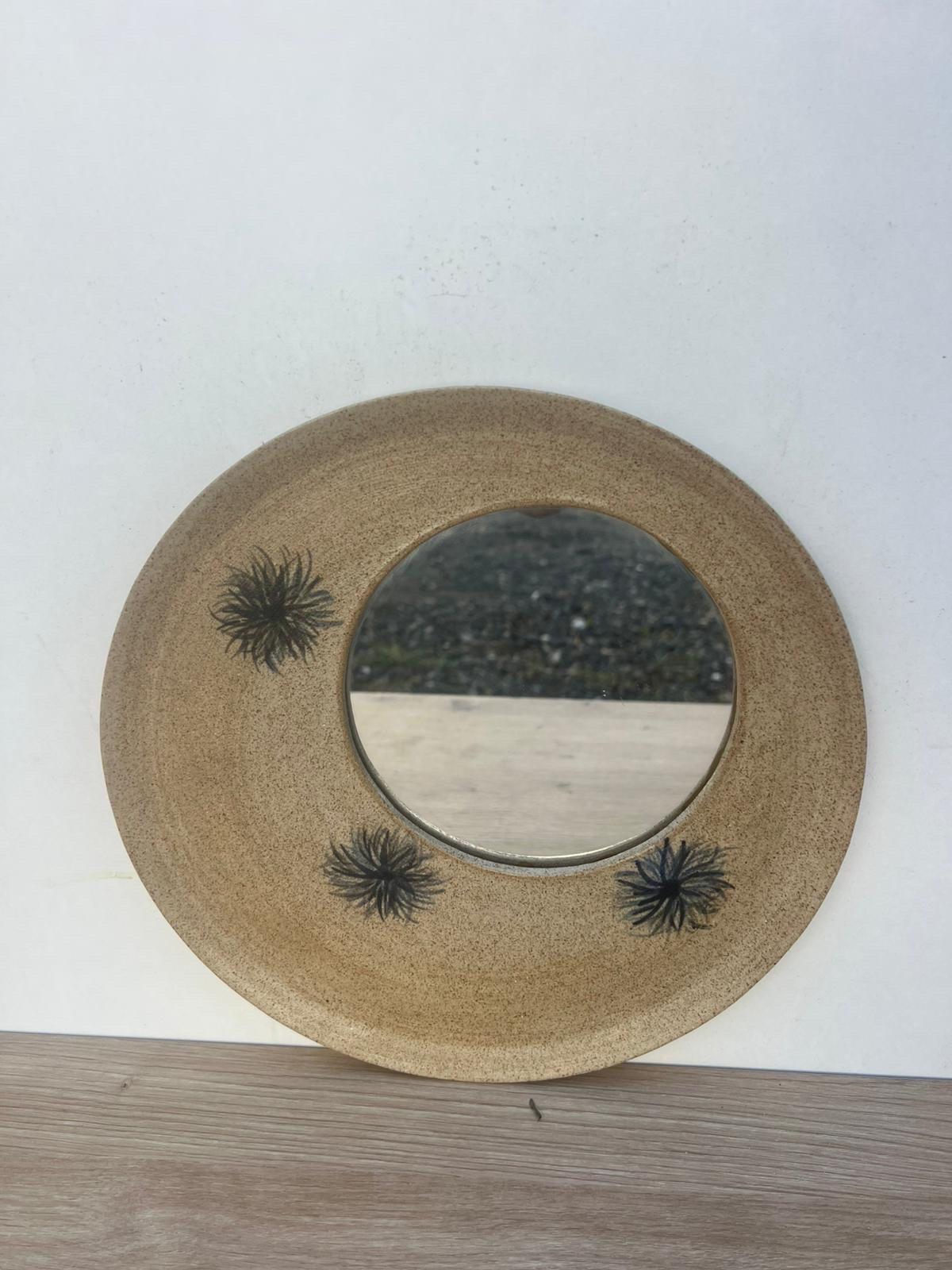 a ceramic mirror circa 1960