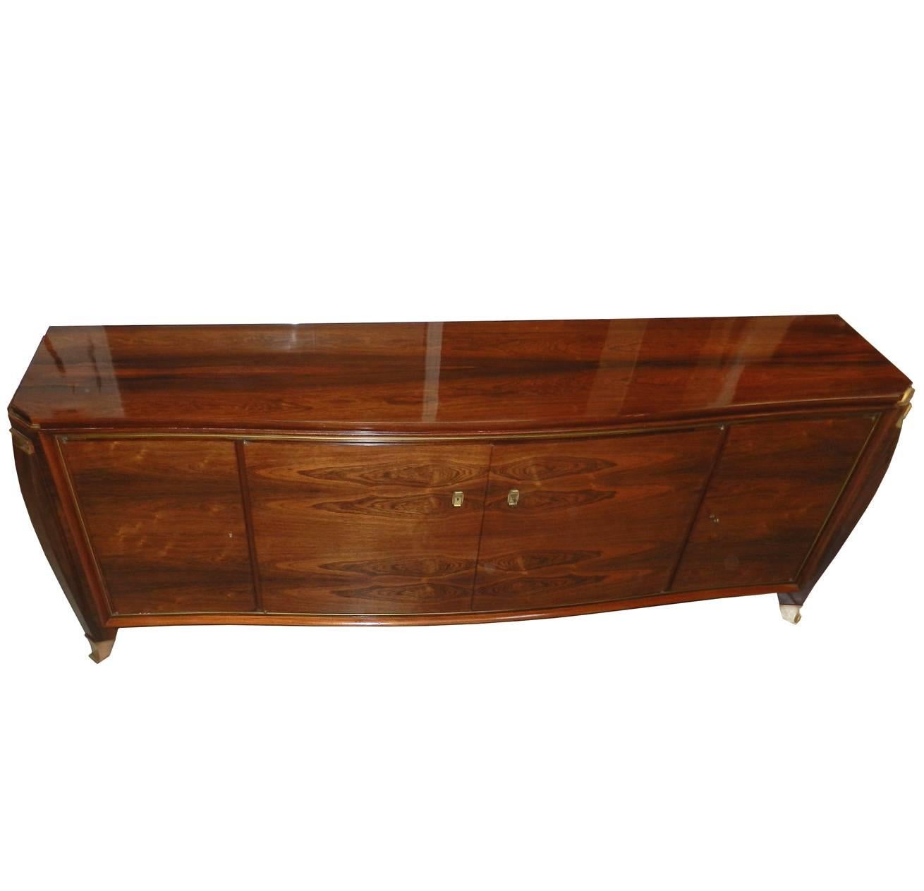 Maurice Rinck, large sideboard in rosewood veneer and gilt bronze.
Fully restored, French varnish,
circa 1930.