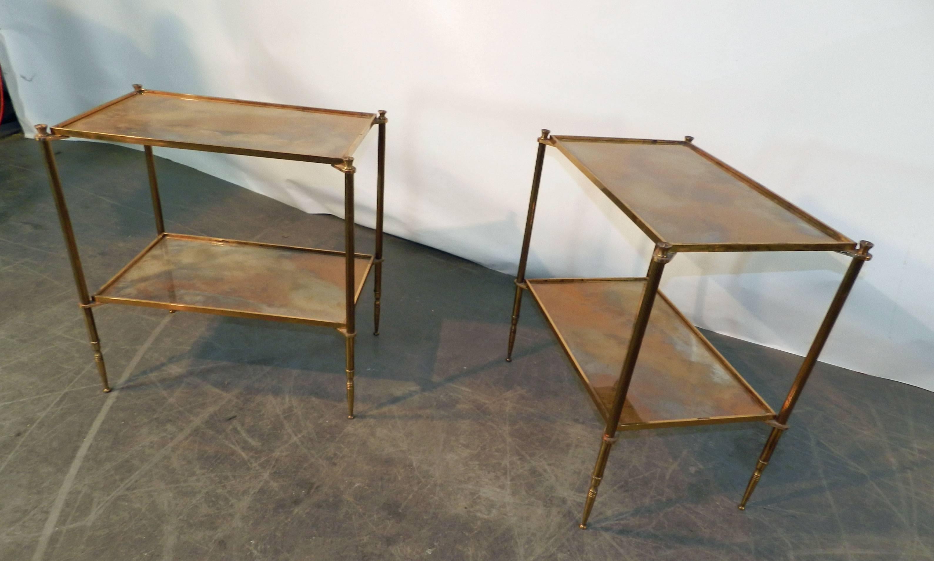 Maison Baguès, air of side tables in gilt metal, top in cloudy mirror.
