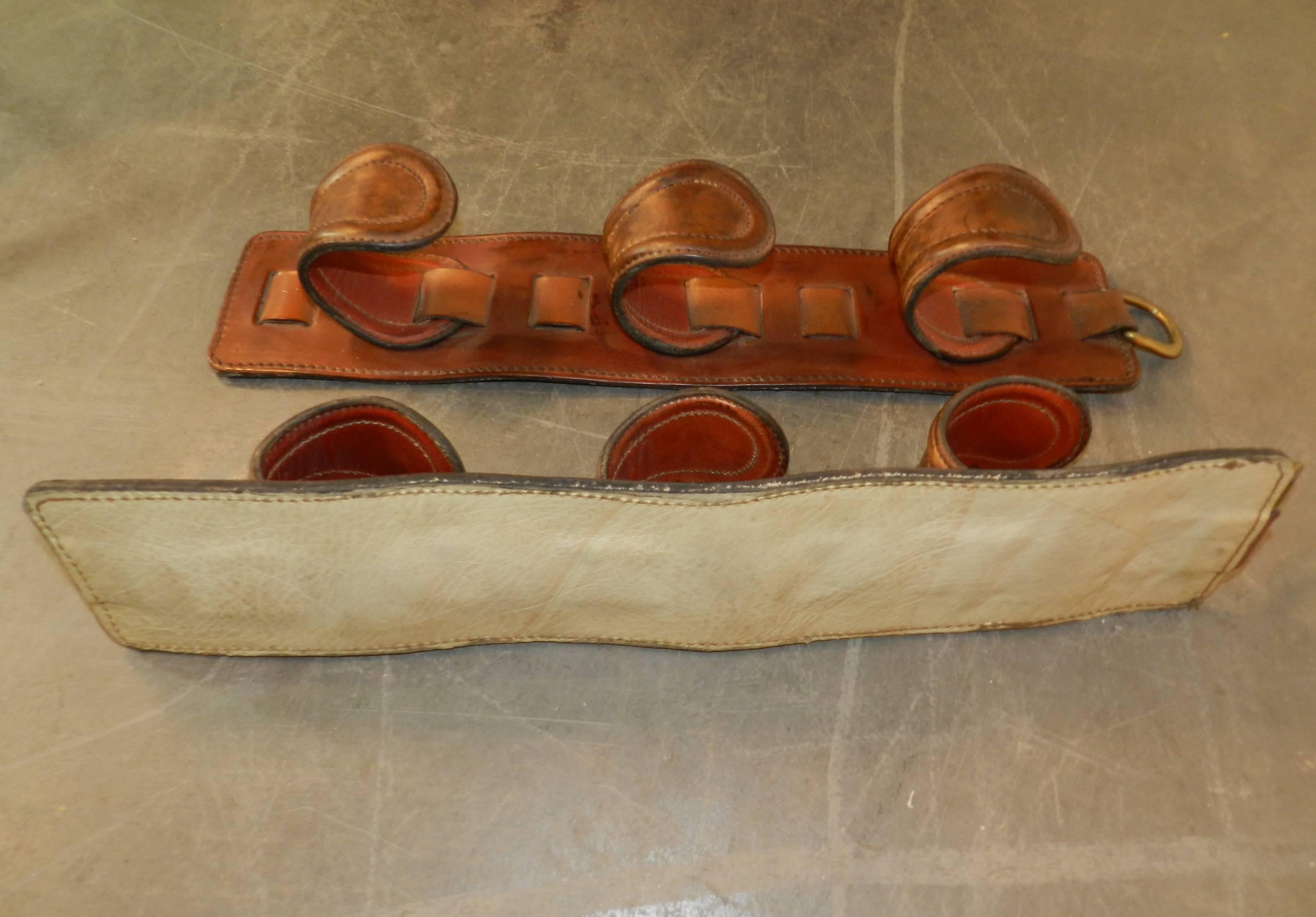 French Pair of Gun Racks in Leather in the Style of Jacques Adnet, circa 1950